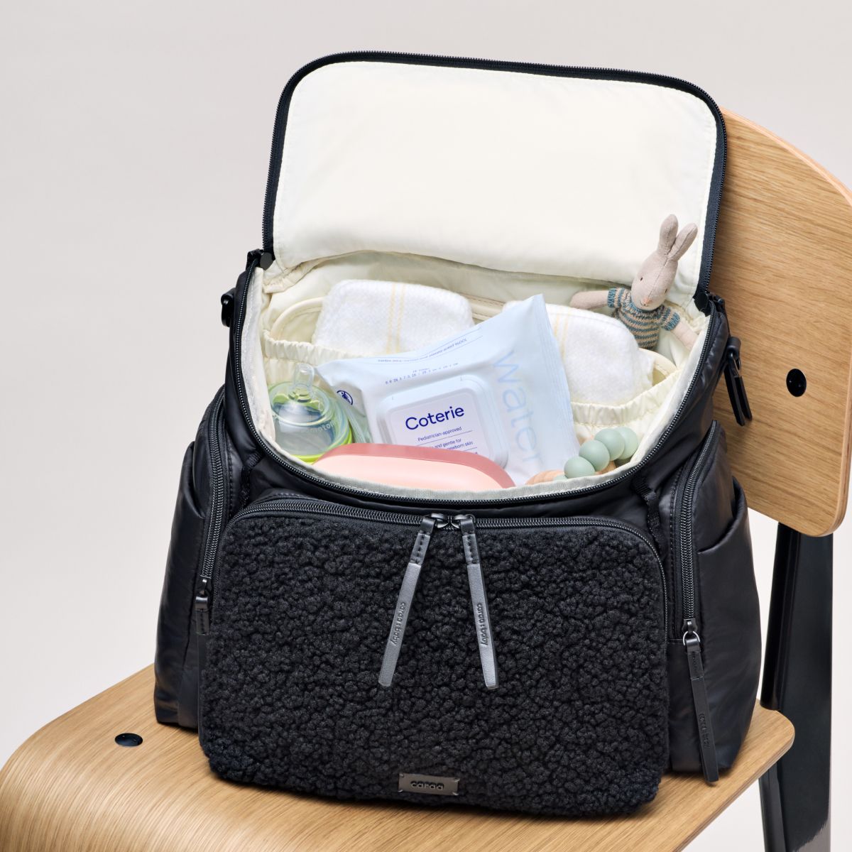 What Goes In a Diaper Bag? Coterie