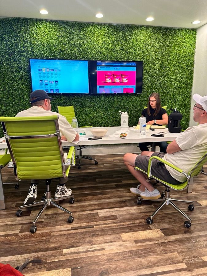 Around the Snacktime Brands conference table, mid-deal
