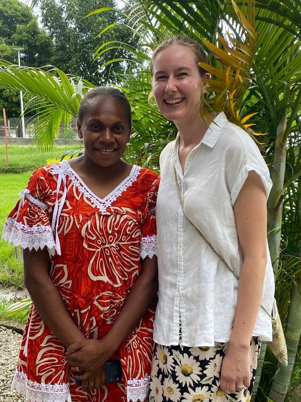 Two women smiling at the camera