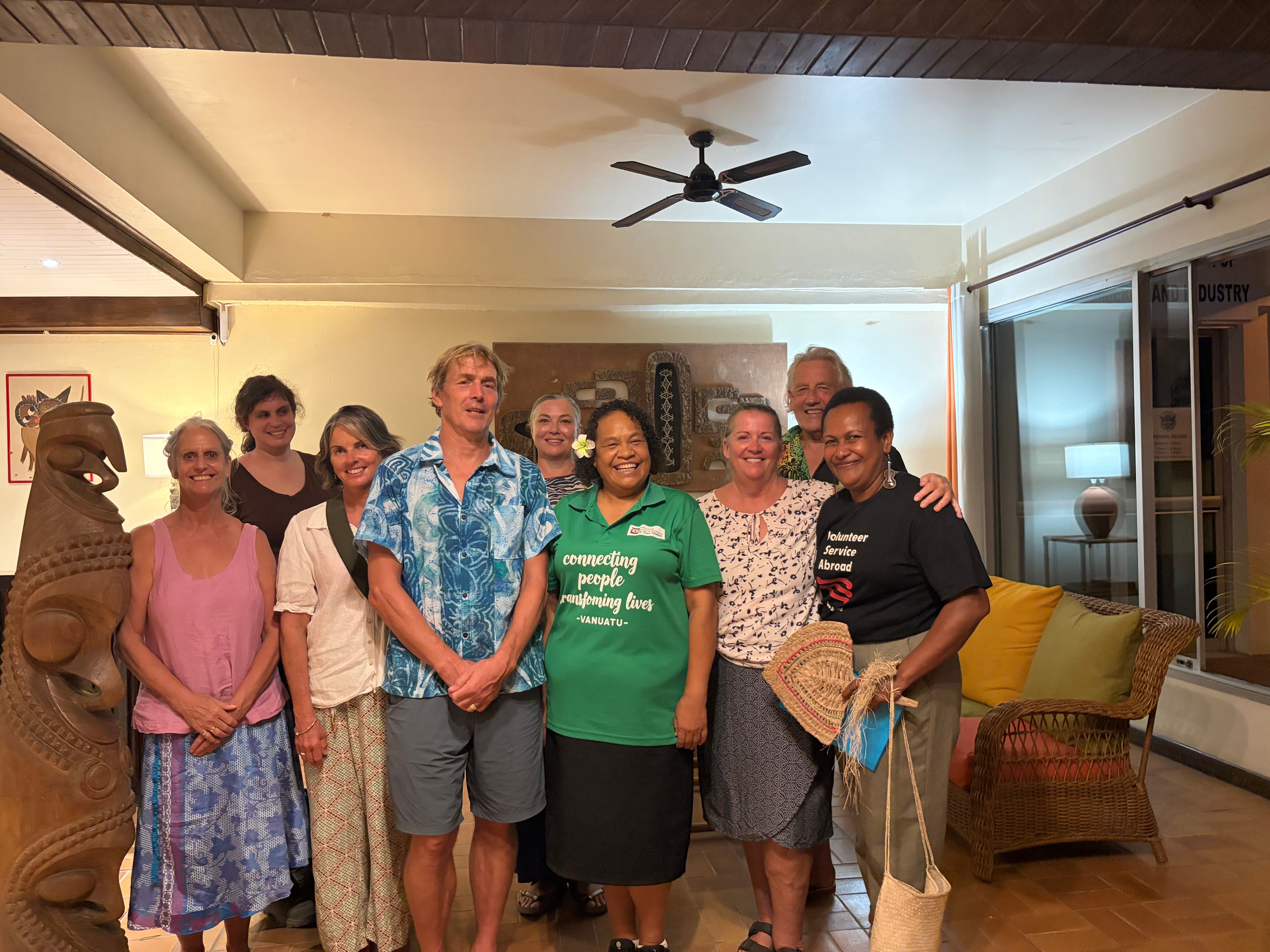 A group of people smiling for the camera