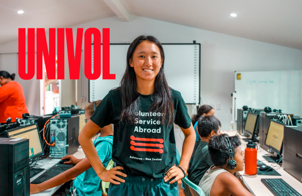 a woman wearing a shirt that says volunteer service abroad a woman wearing a shirt that says volunteer service abroad