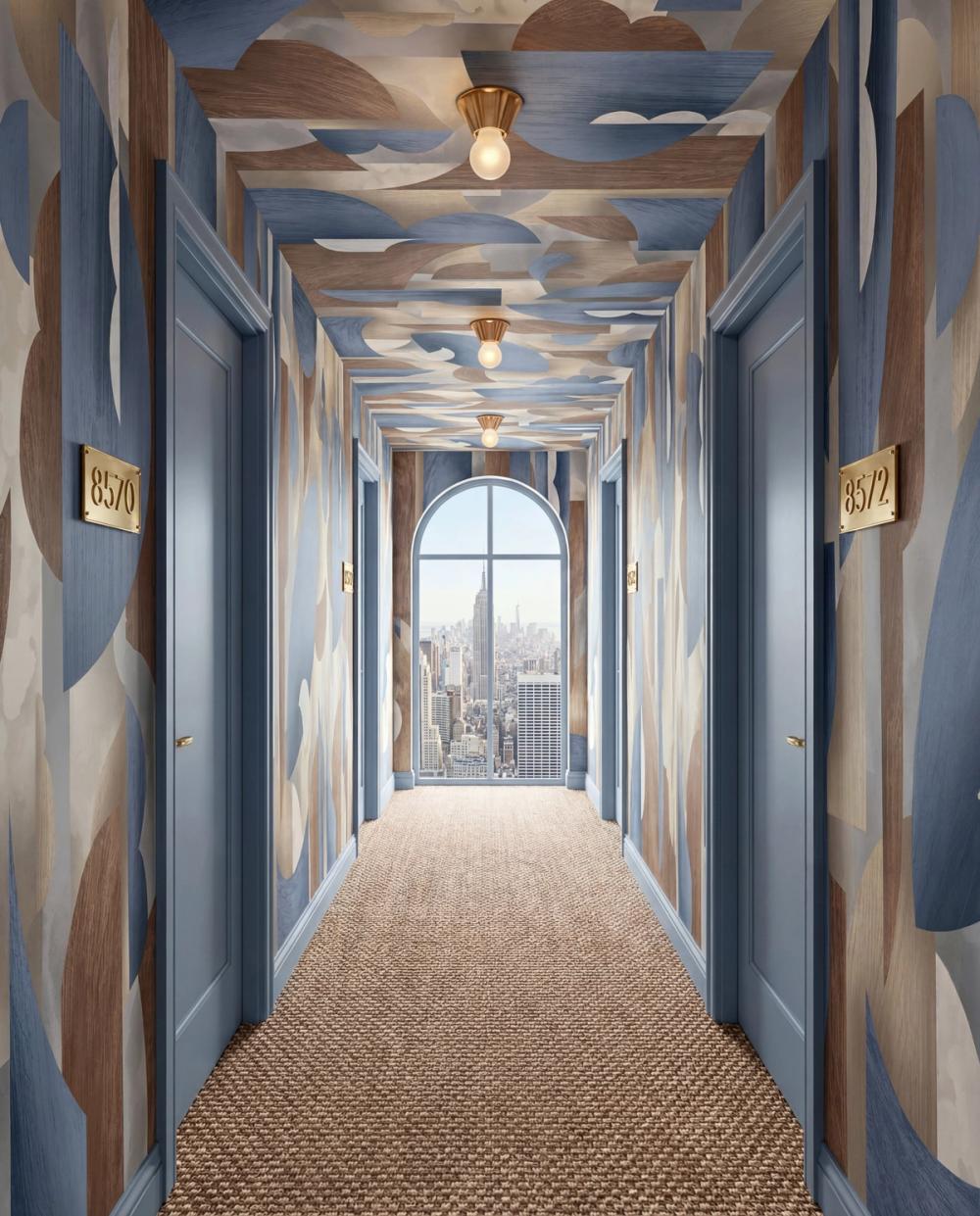 an interior photo of a hotel corridor with a blue wallpaper and a window overlooking manhattan skyline