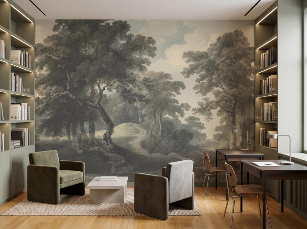 an interior photo of a high school reading room with a forest themed wallpaper mural on the wall