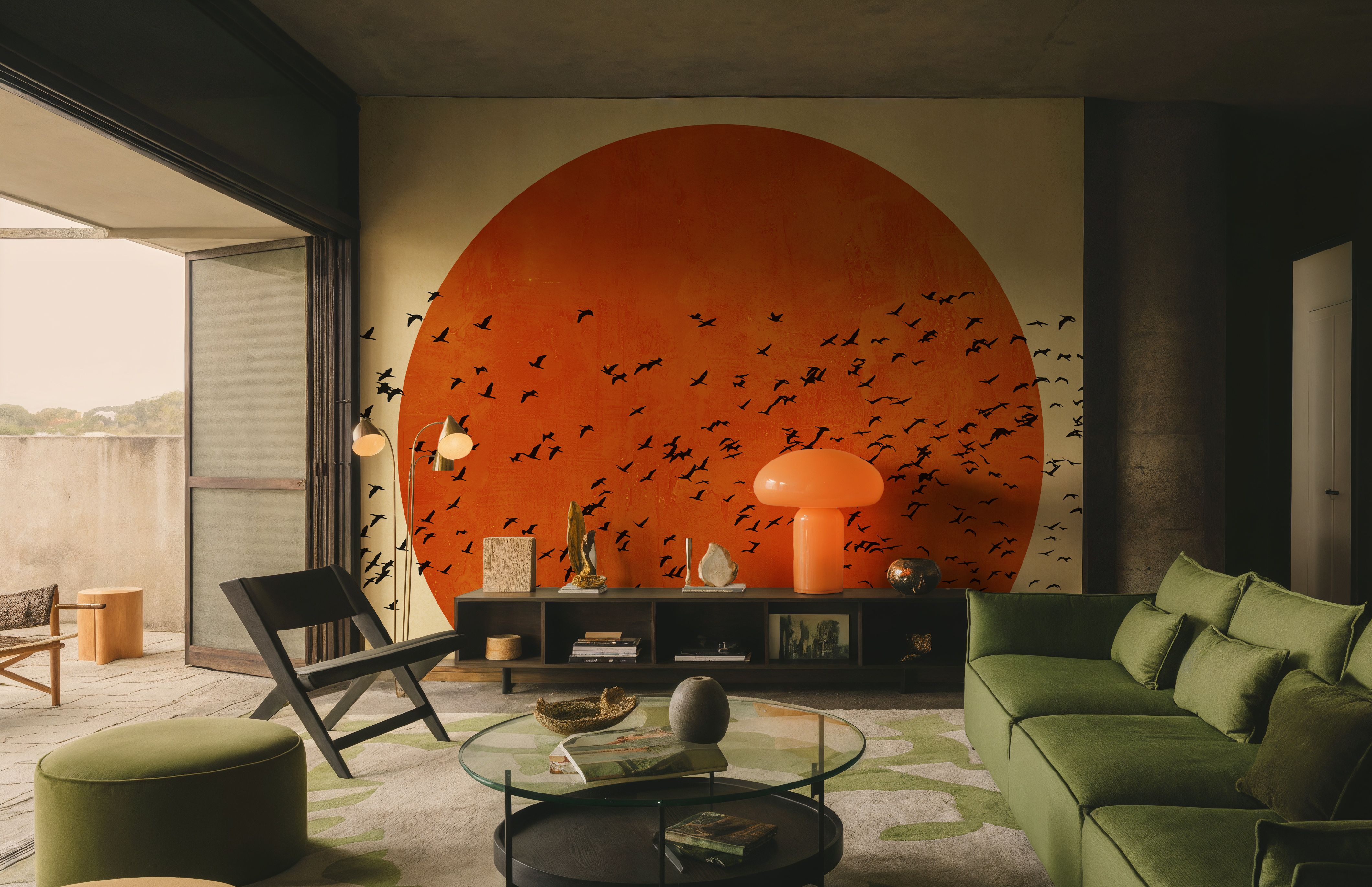 Birds catching the light across a wide wall