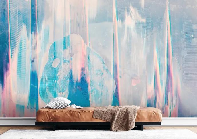 Bild eines Bettes mit einer lebendigen Fototapeten-Wandmalerei dahinter.