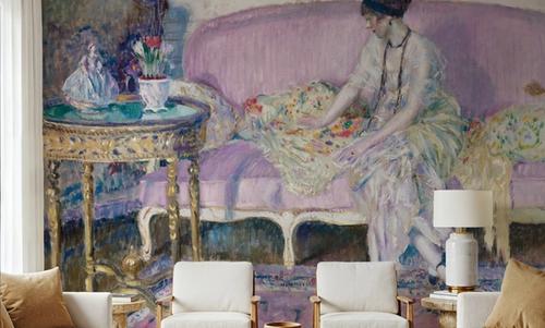 Woman Seated on Interior Sofa