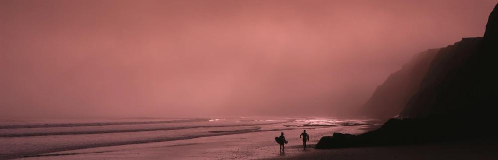 Sunset Surfers Silhouette