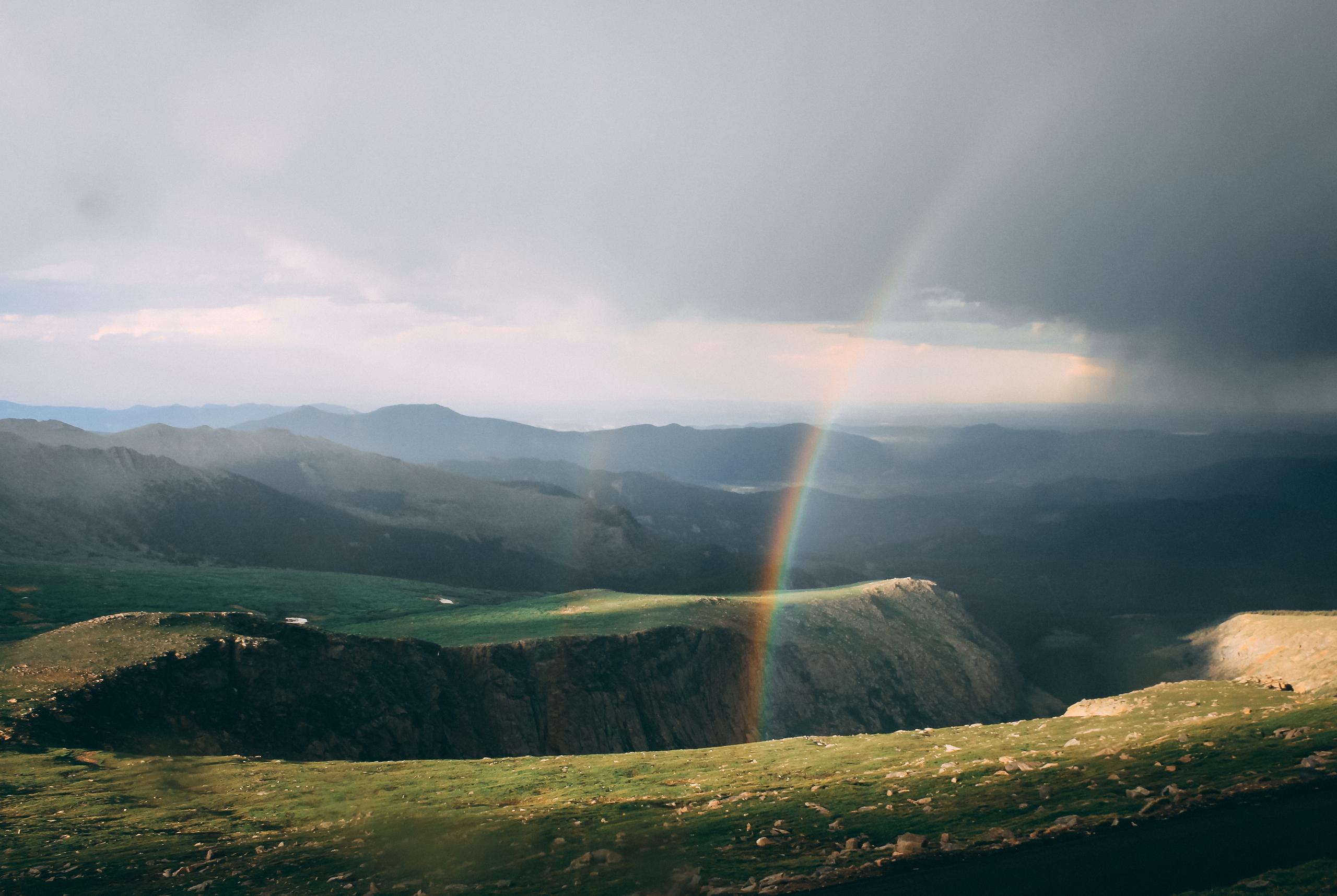 Rainbow in valley of Mount Evans, Idaho Springs by David Barajas