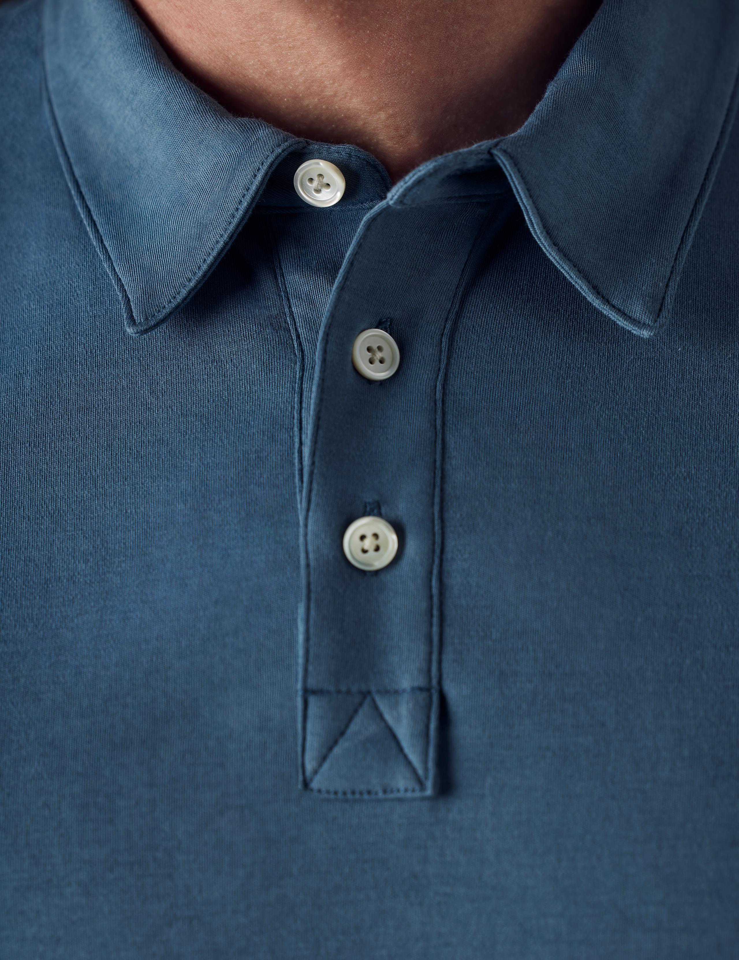 Triangle stitch at end of placket detail of Emery Pima Polo