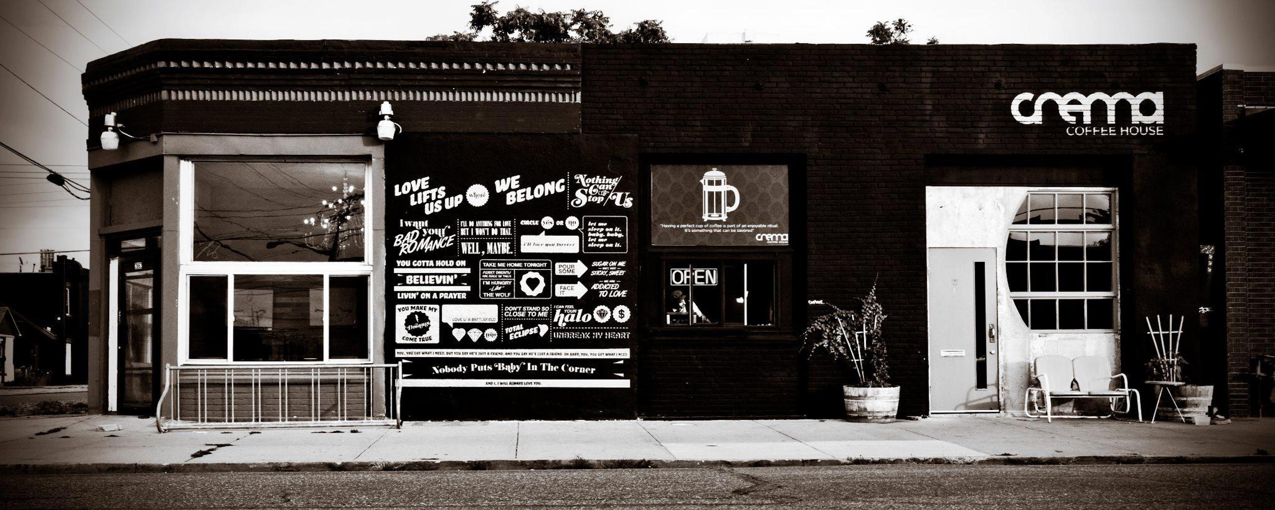 Black and white exterior view of Crema Coffee House