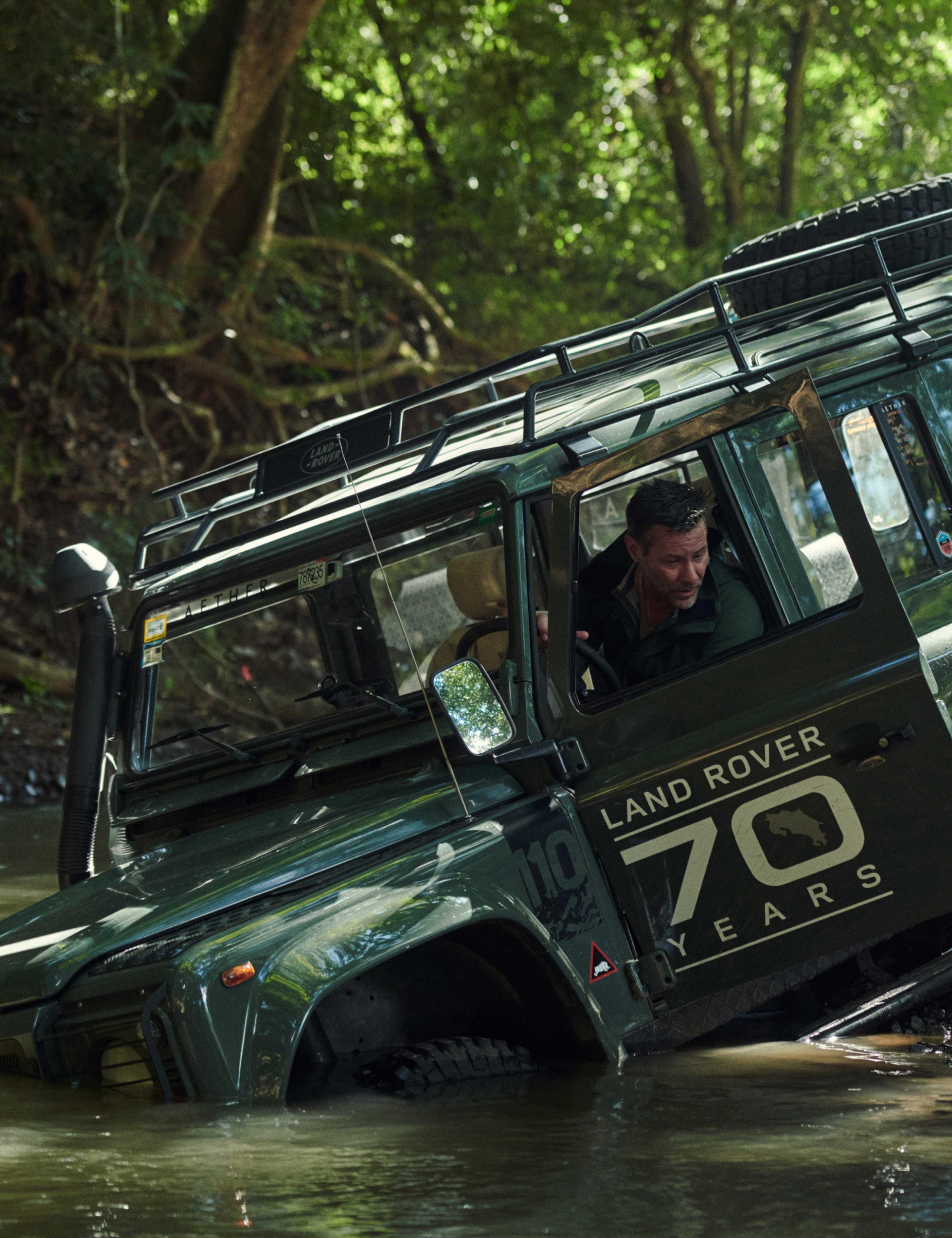 Land Rover stuck in water while adventuring in Costa Rica