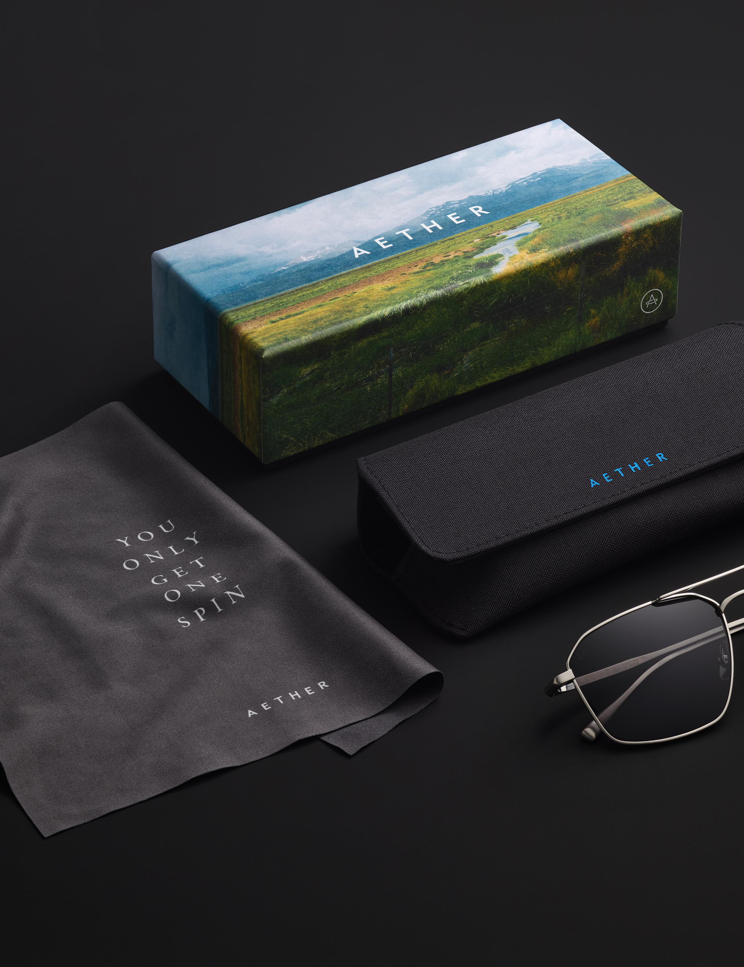 Still life shot of Arches Sunglasses with packaging. 