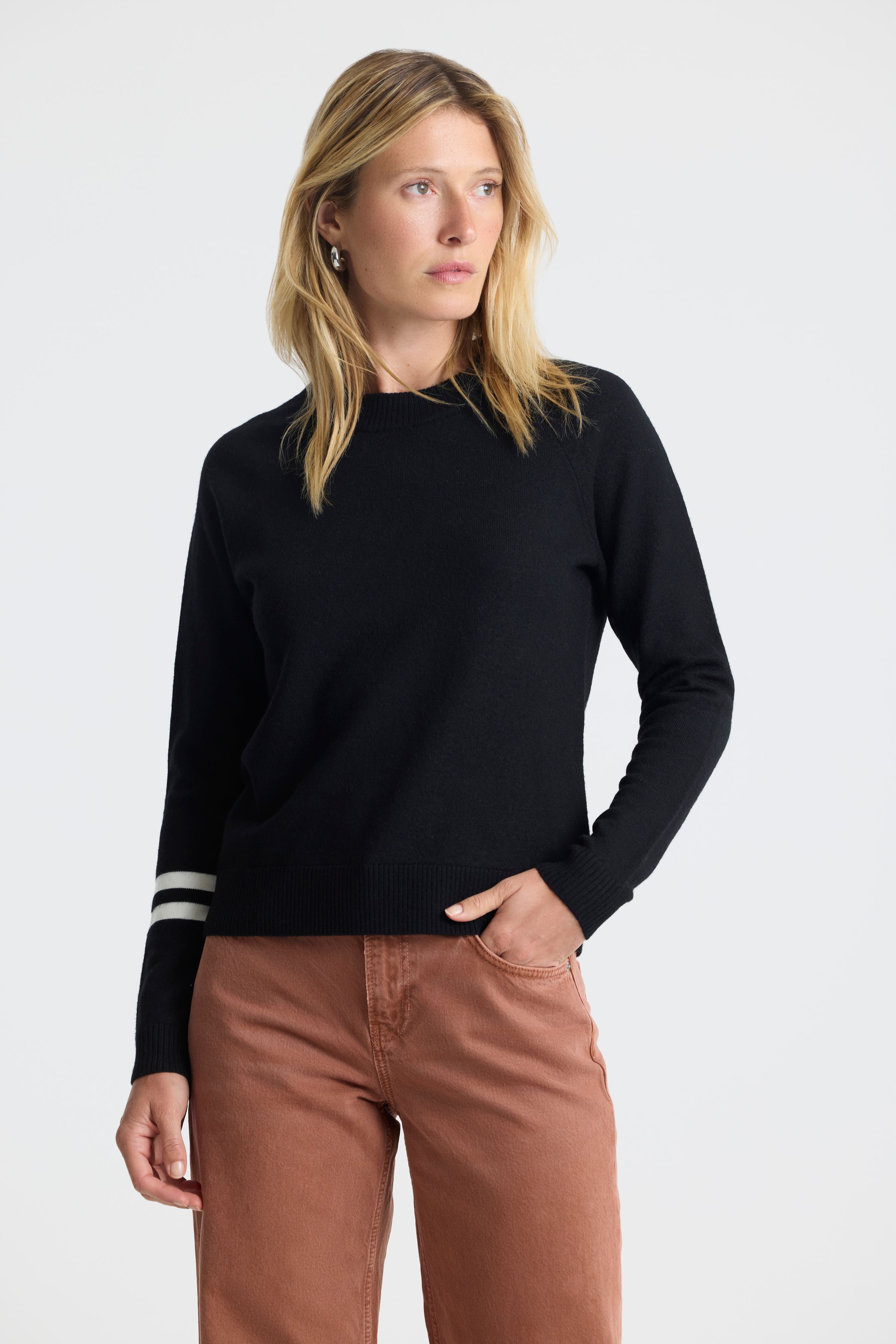 Woman wearing Racer Sweater 2.0 in Onyx Black