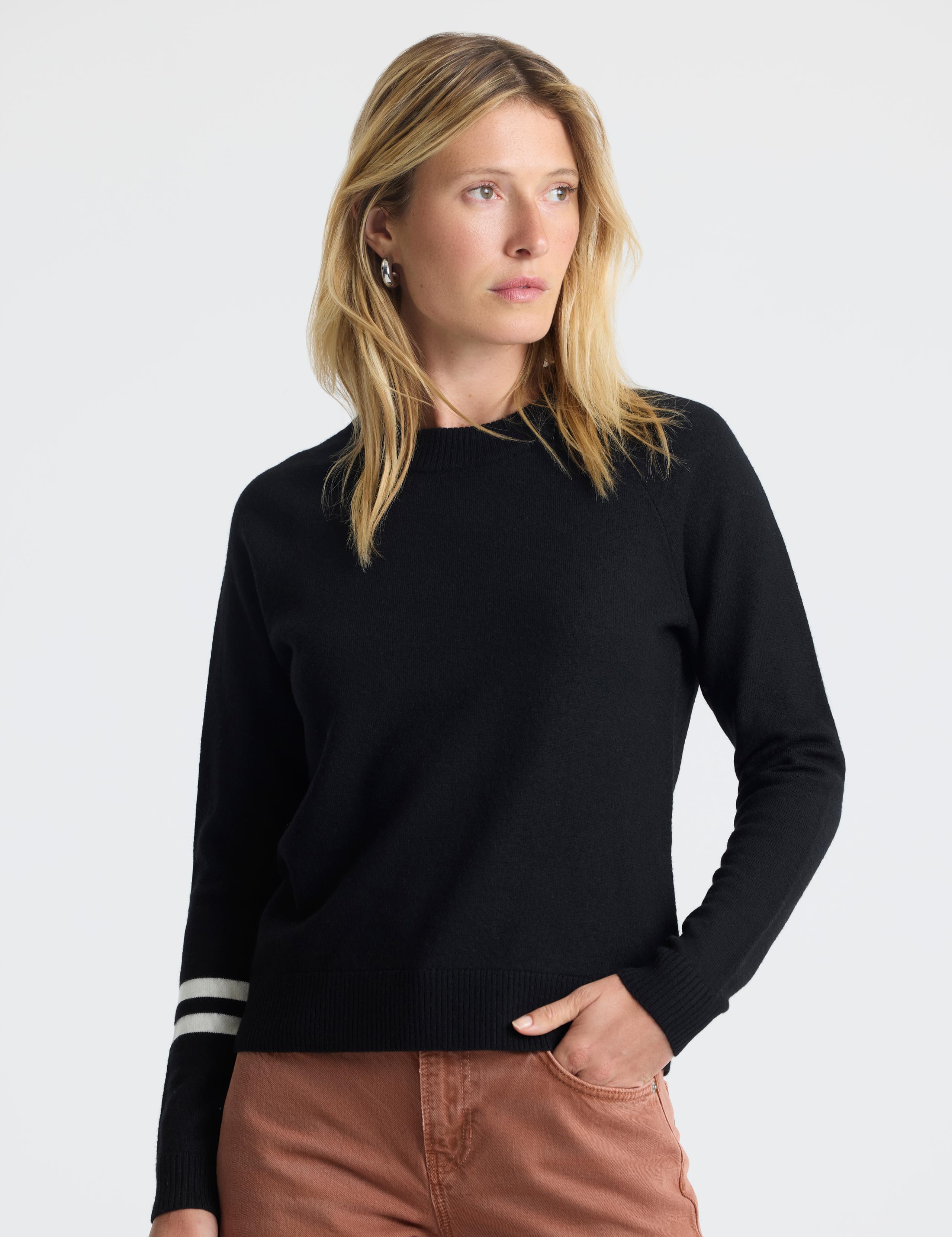 Woman wearing Racer Sweater 2.0 in Onyx Black