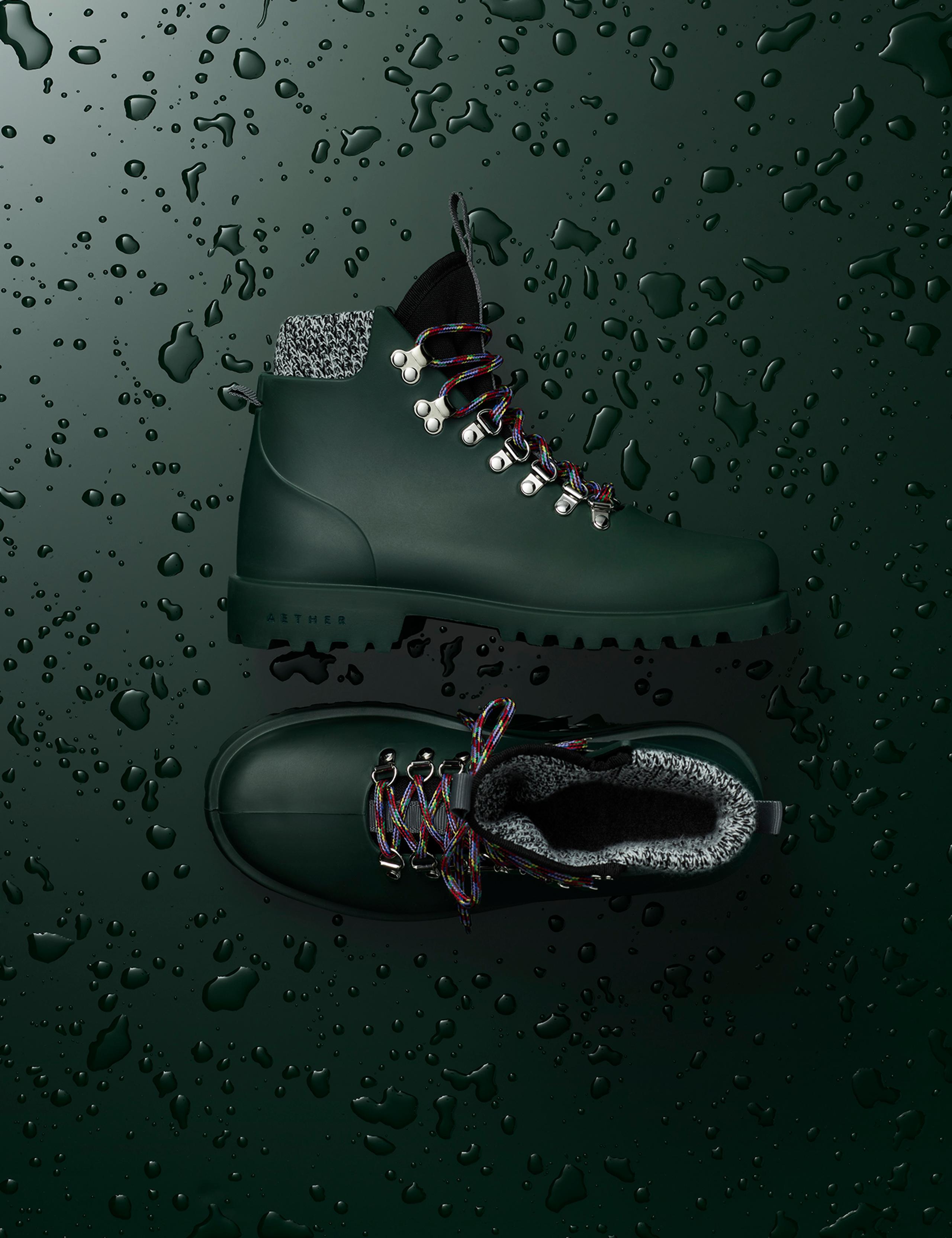 Studio photo of the Women's Rain Boot in profile and top view against a wet background