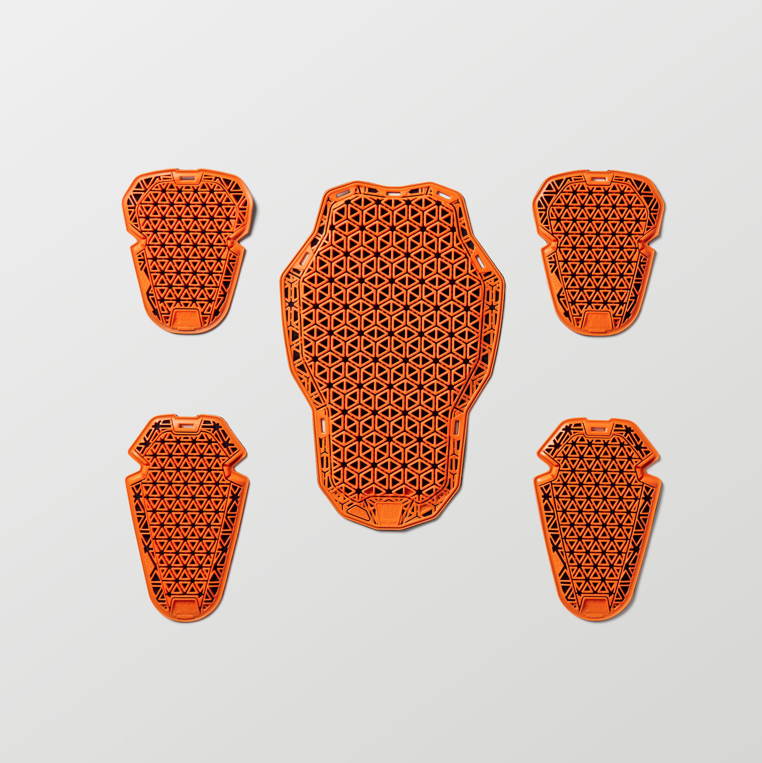 Studio laydown of D3O® orange Ghost™ pads