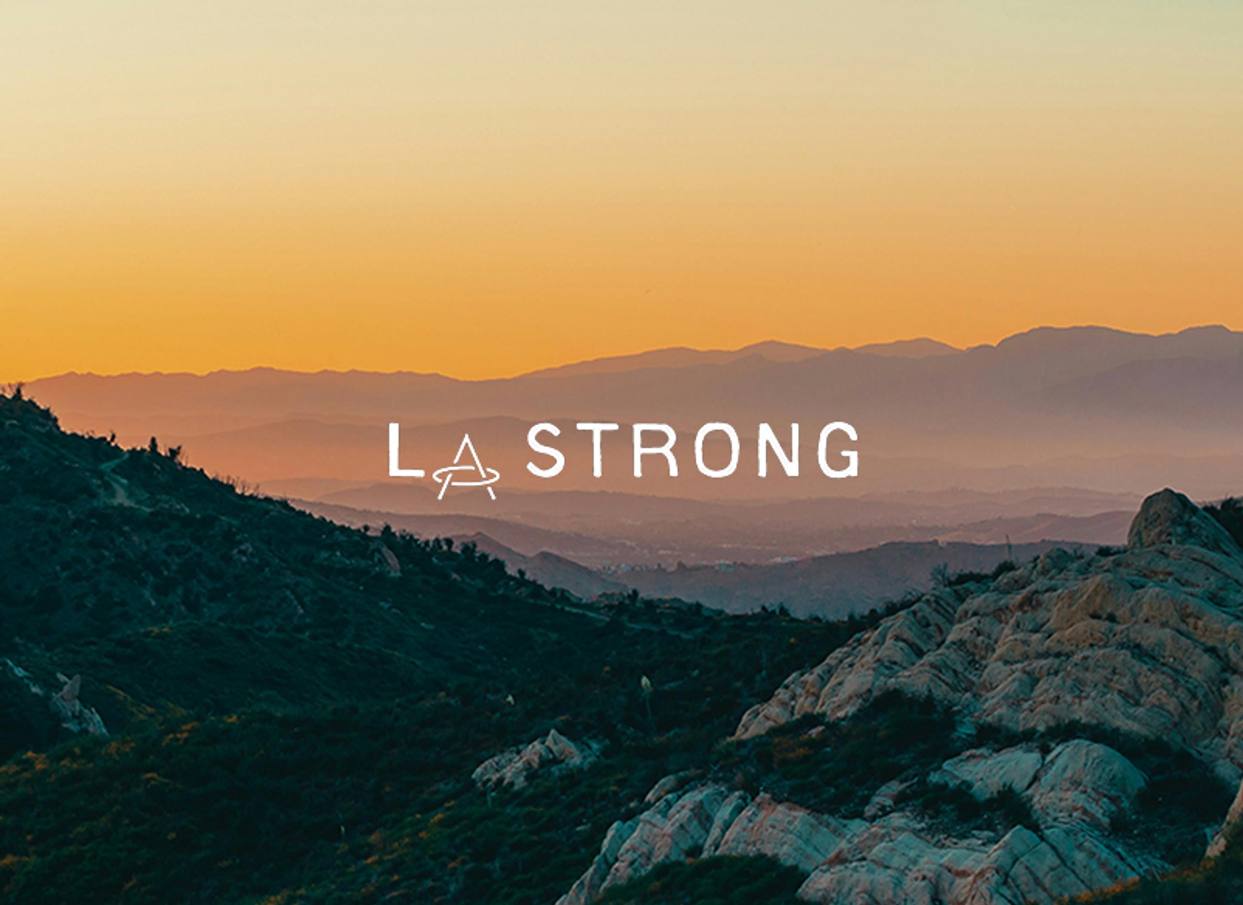 Sunset photo of Santa Monica Mountains with "LA Strong" overlayed