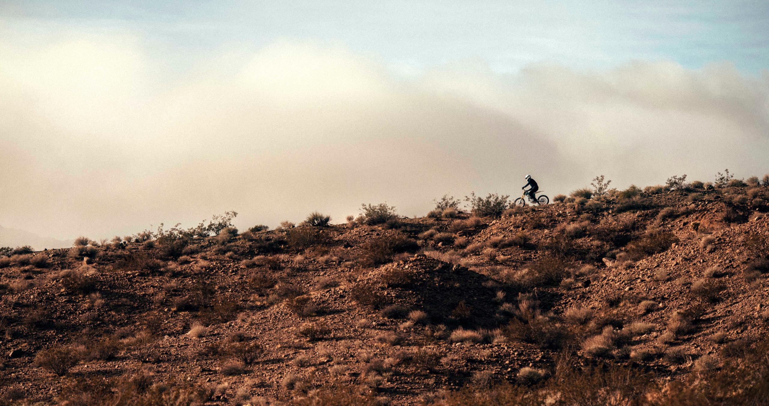 Men riding motorcycle