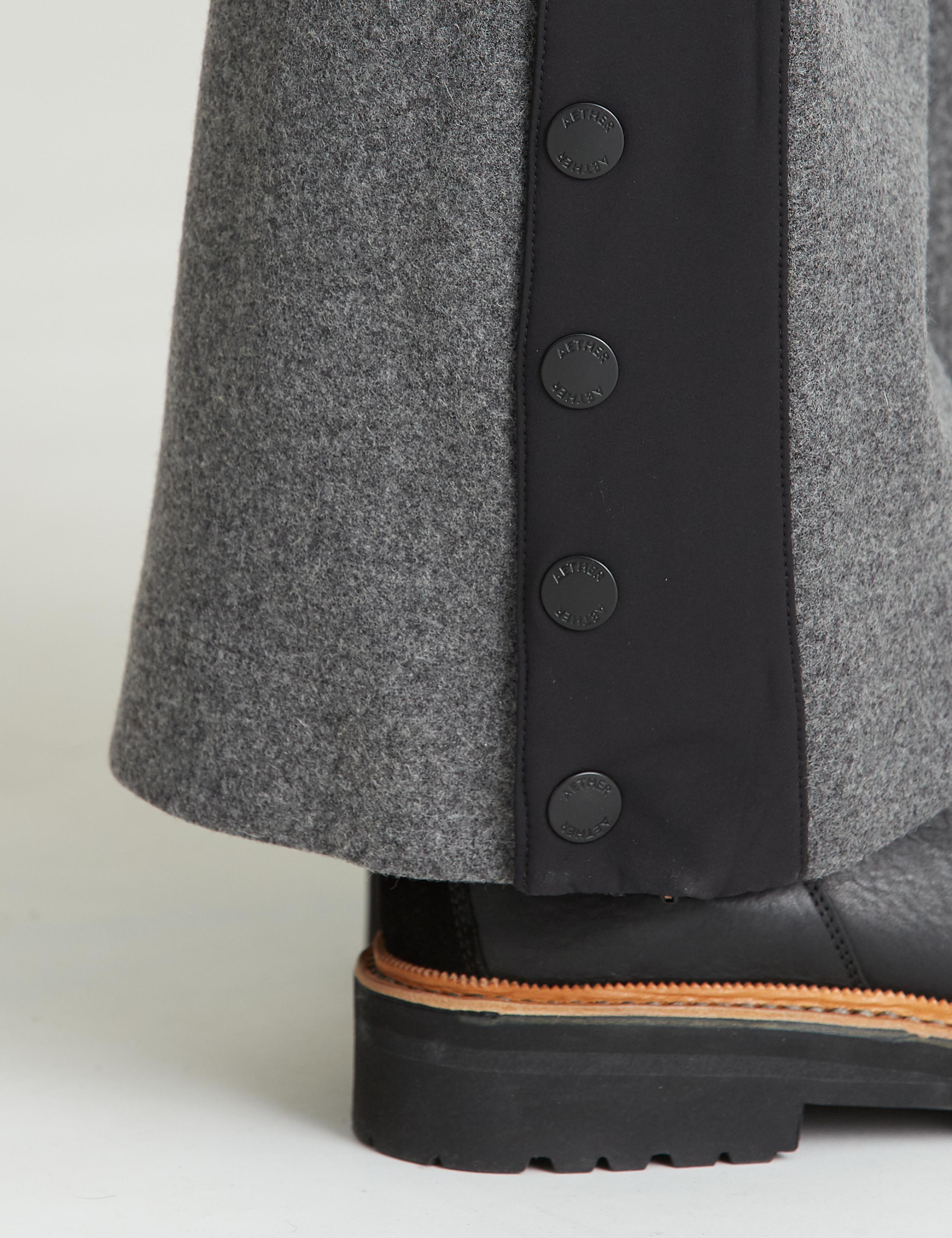 Closeup view of exposed-snap placket at the bottom leg of the Victory Wool Snow Pant