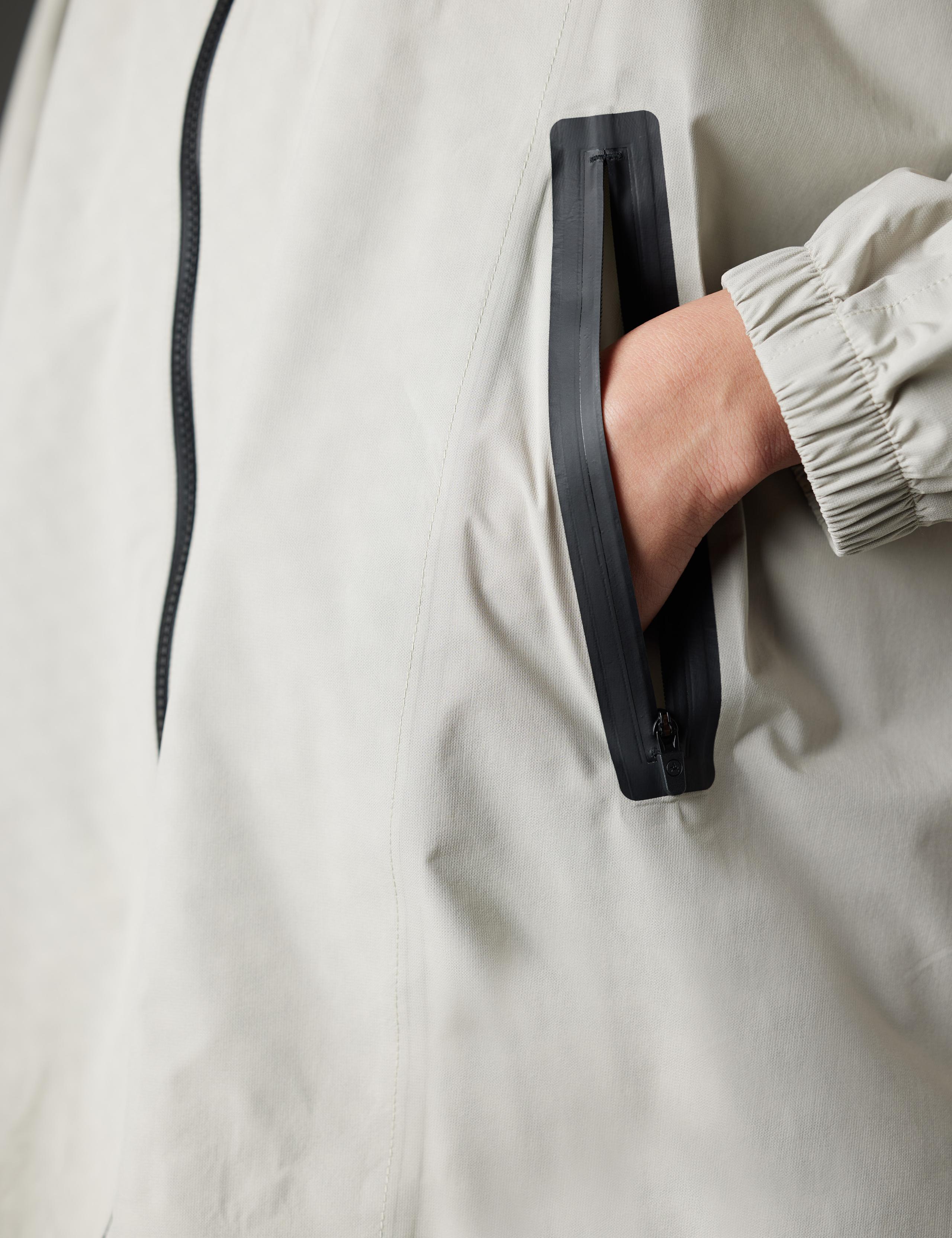 Closeup detail of seam-taped zippered hand pocket