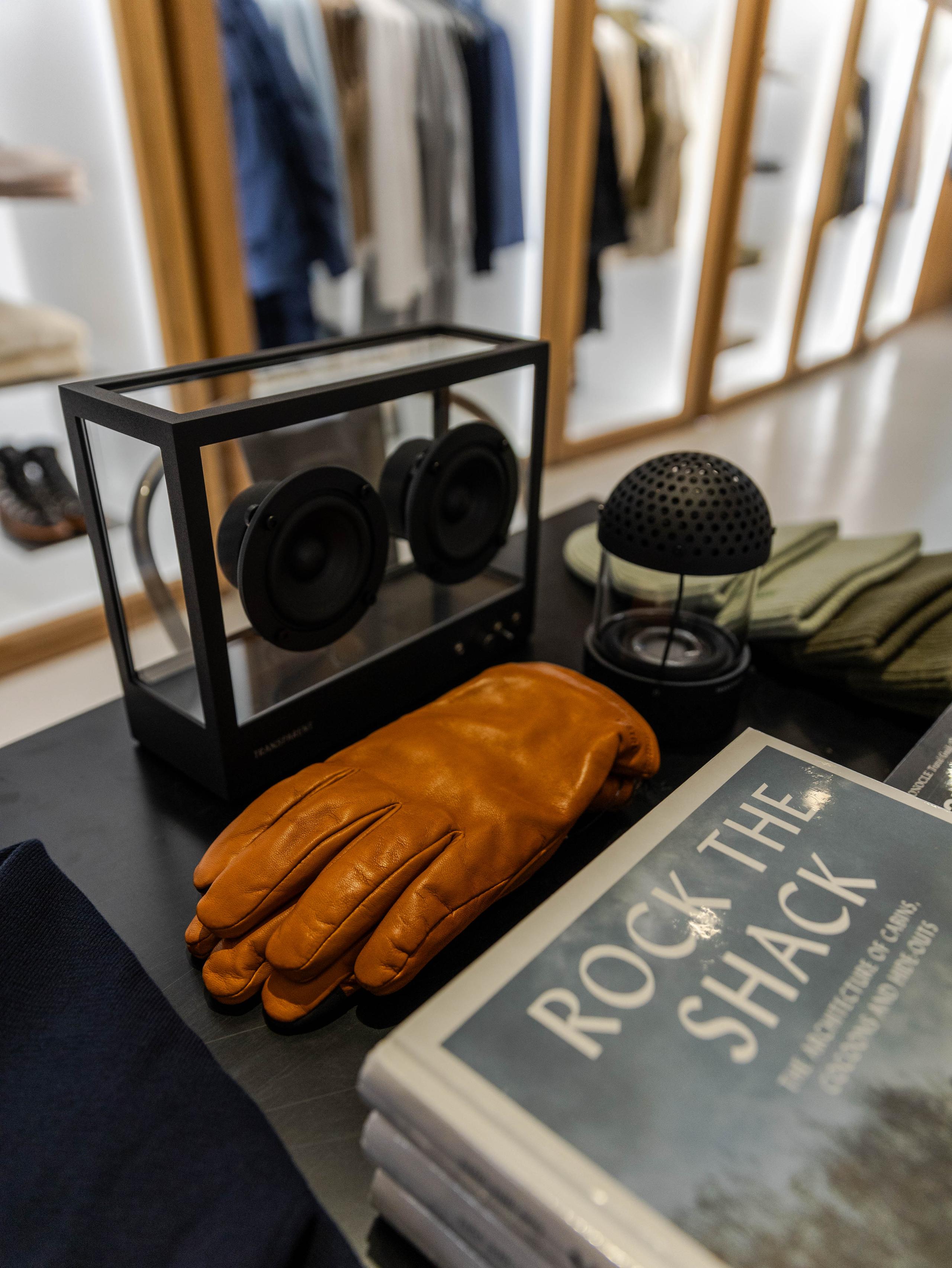 View of gloves and books on table
