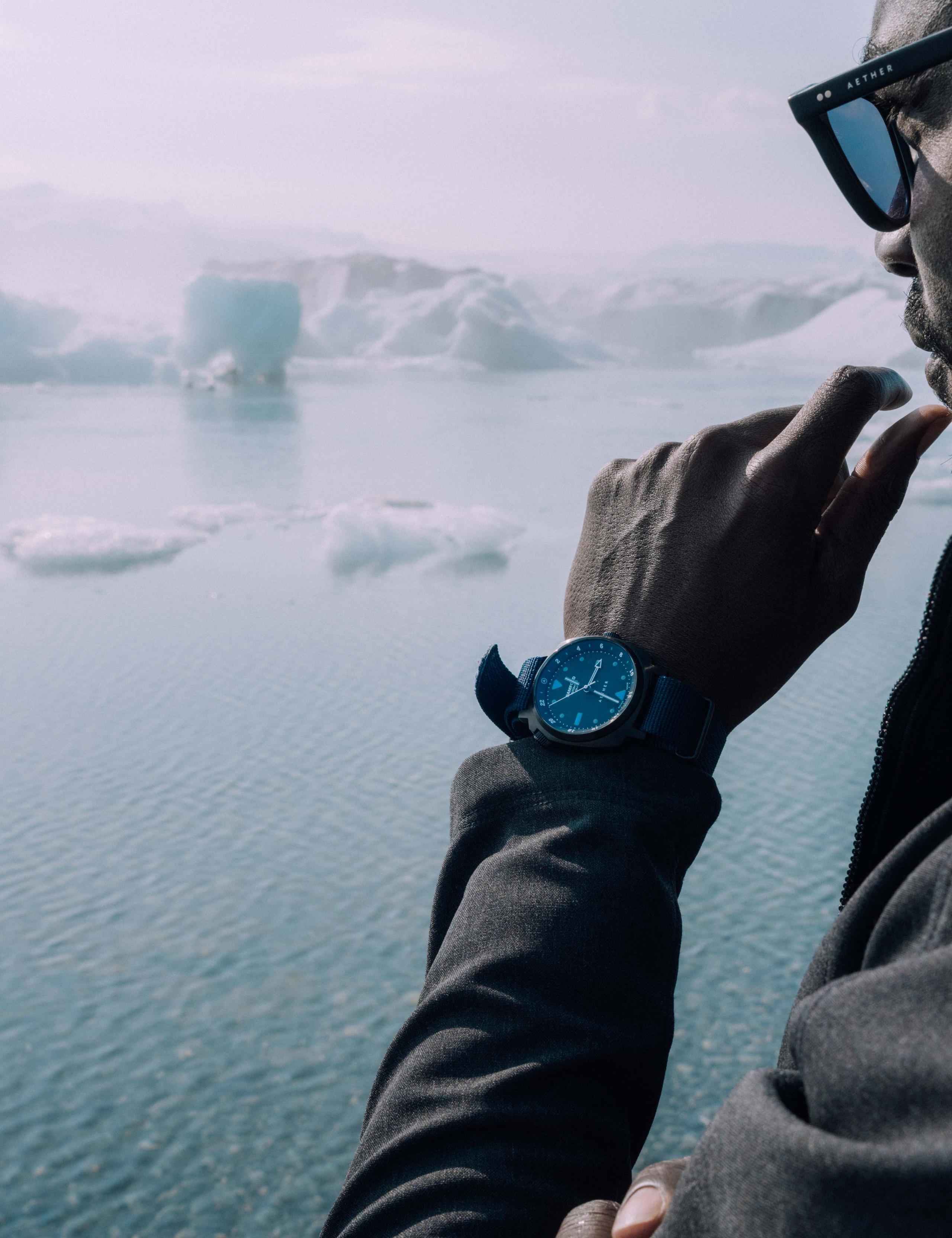 A guy checking his watch in Iceland