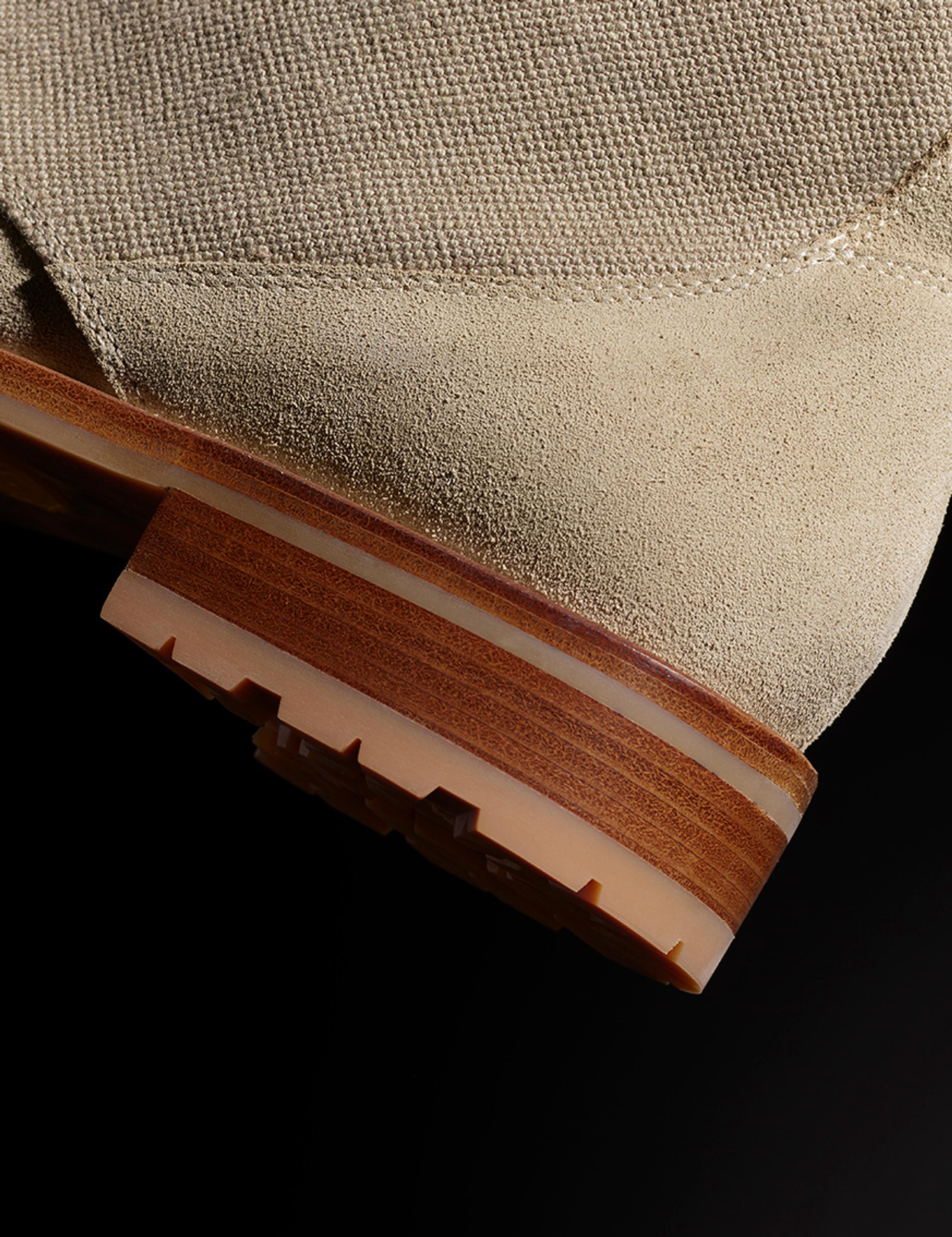 Closeup view of stacked leather heel construction of Ojai Boot