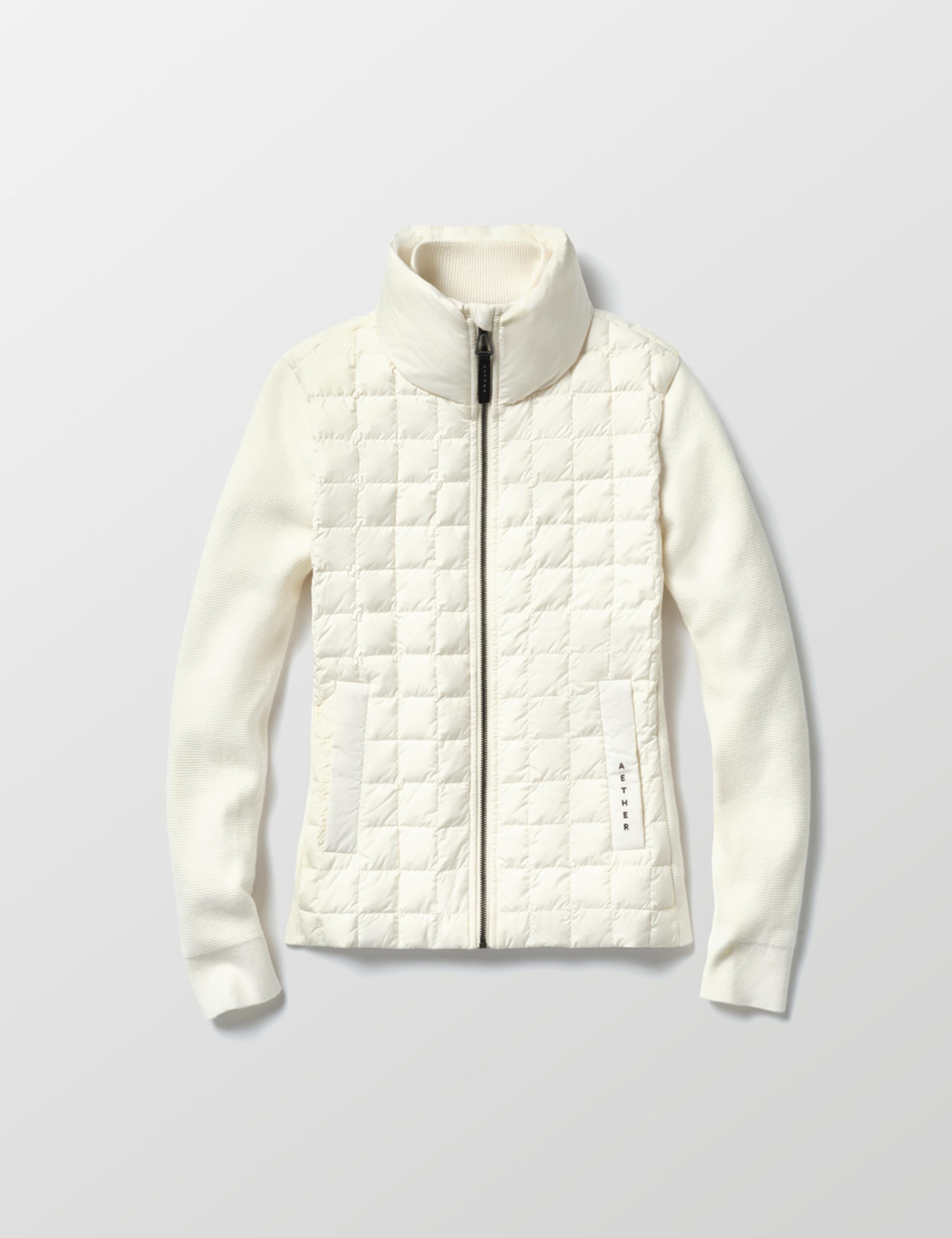 Flat lay of Women's Phase Full-Zip in Winter White from AETHER Apparel