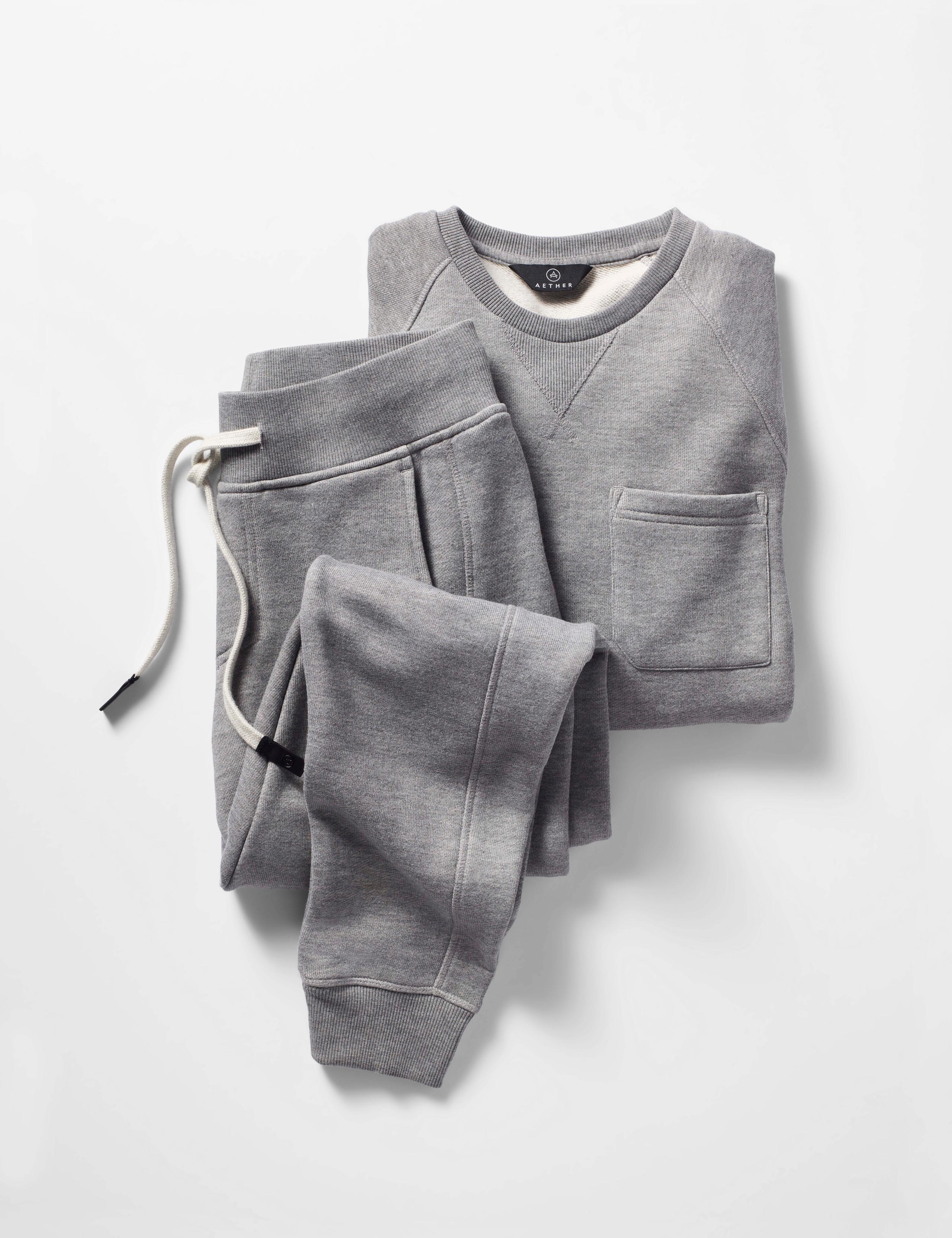 Studio laydown of Men's Foundation Pocket Crew underneath Men's Foundation Sweatpant