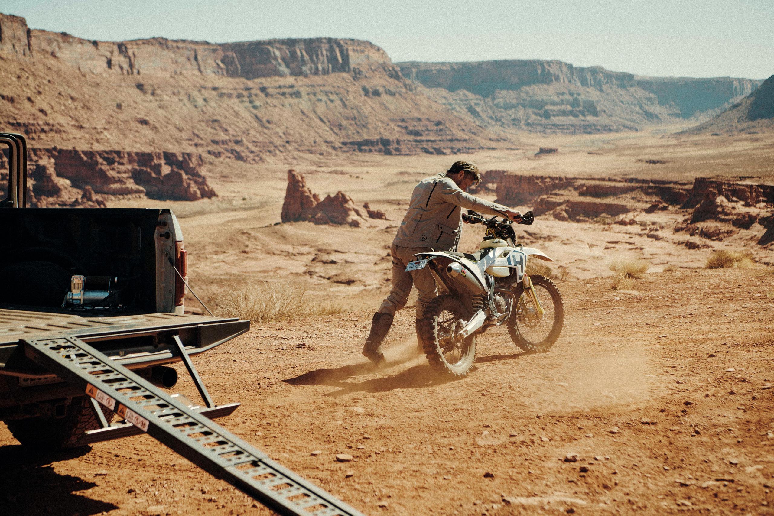 Man riding Cross Motorcycle in the desert.