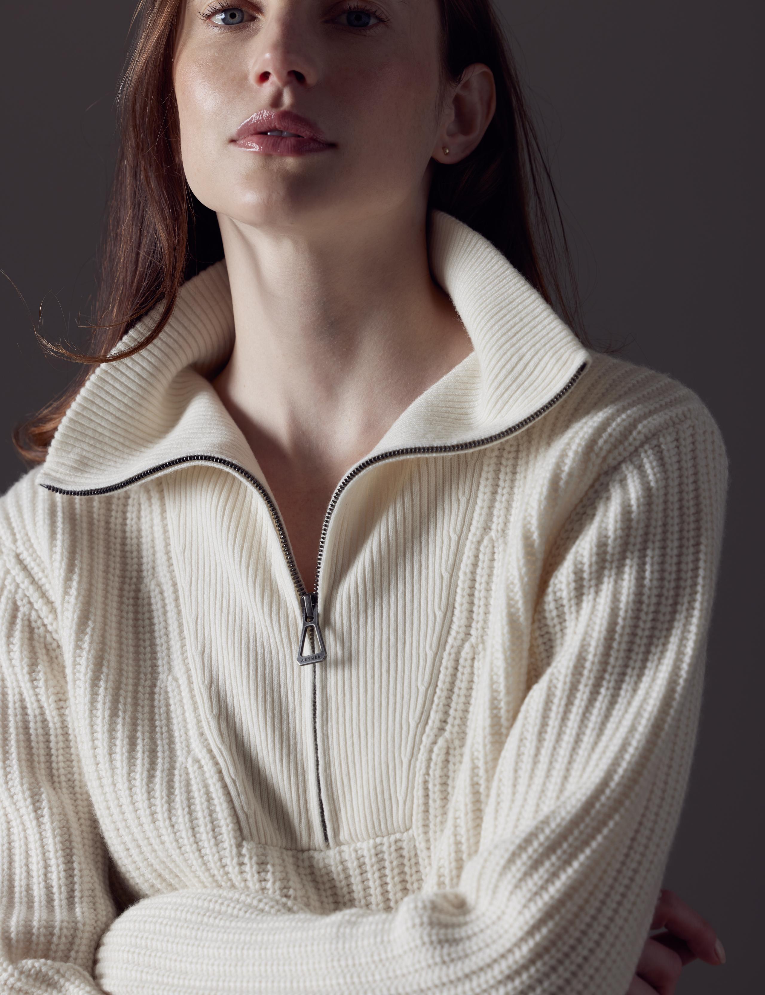 Woman wearing Davis Half-Zip Sweater in Winter White.