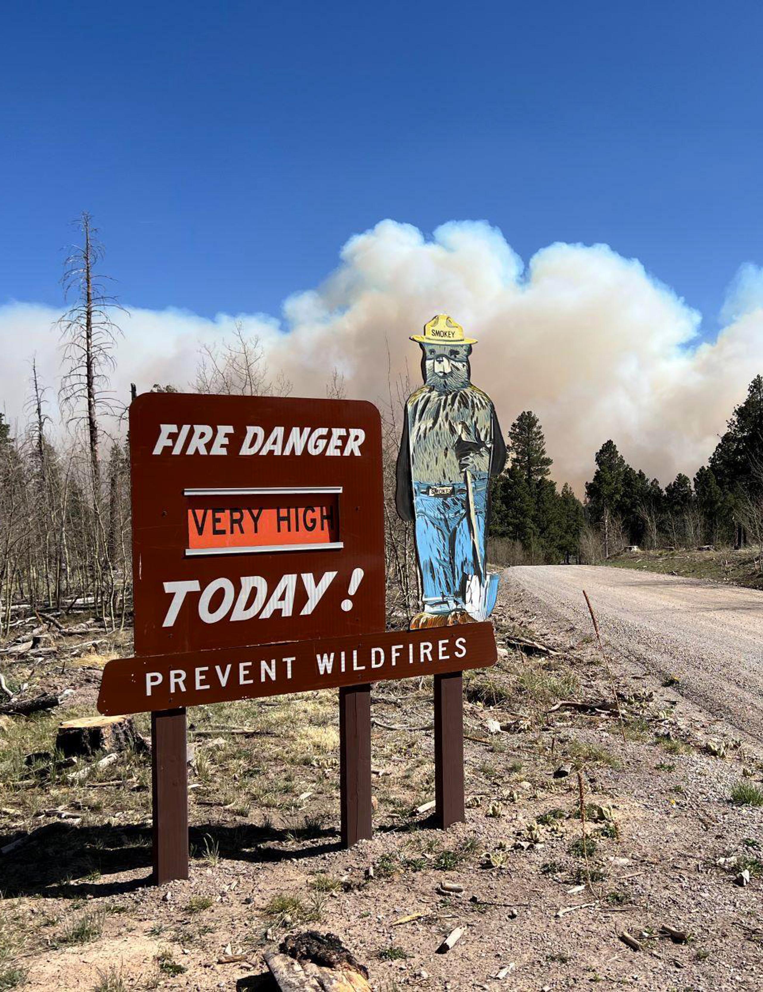 Smokey the Bear fire danger sign indicating VERY HIGH