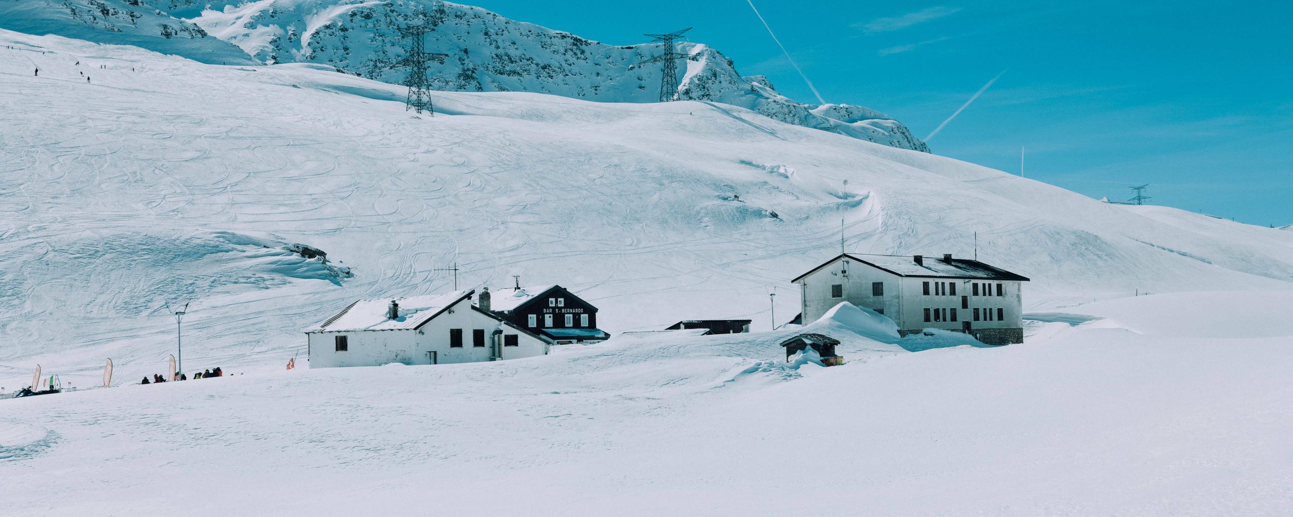 Chalets in snowy mountainside in French Alps