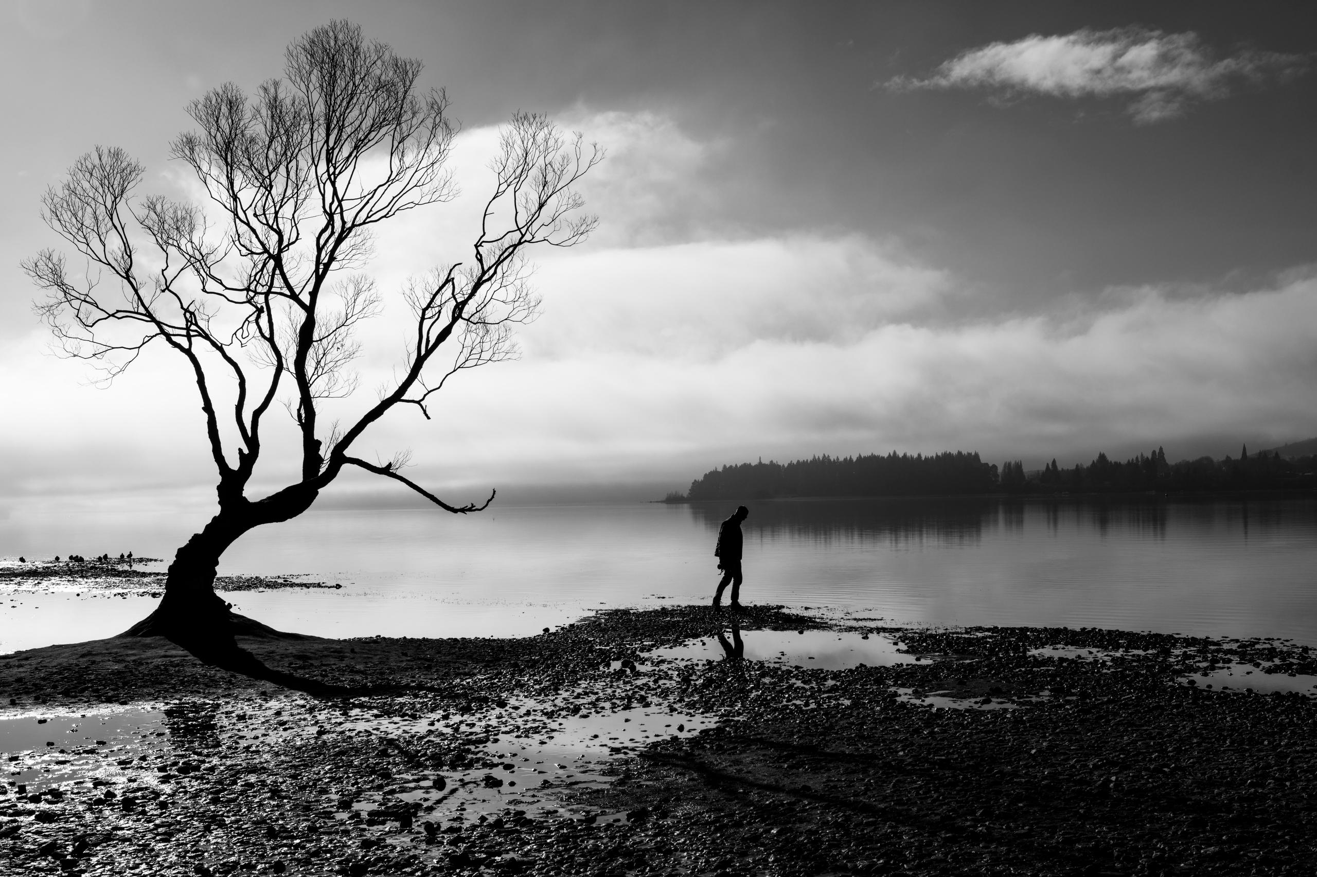 Model standing in a lake bed in New Zealand.