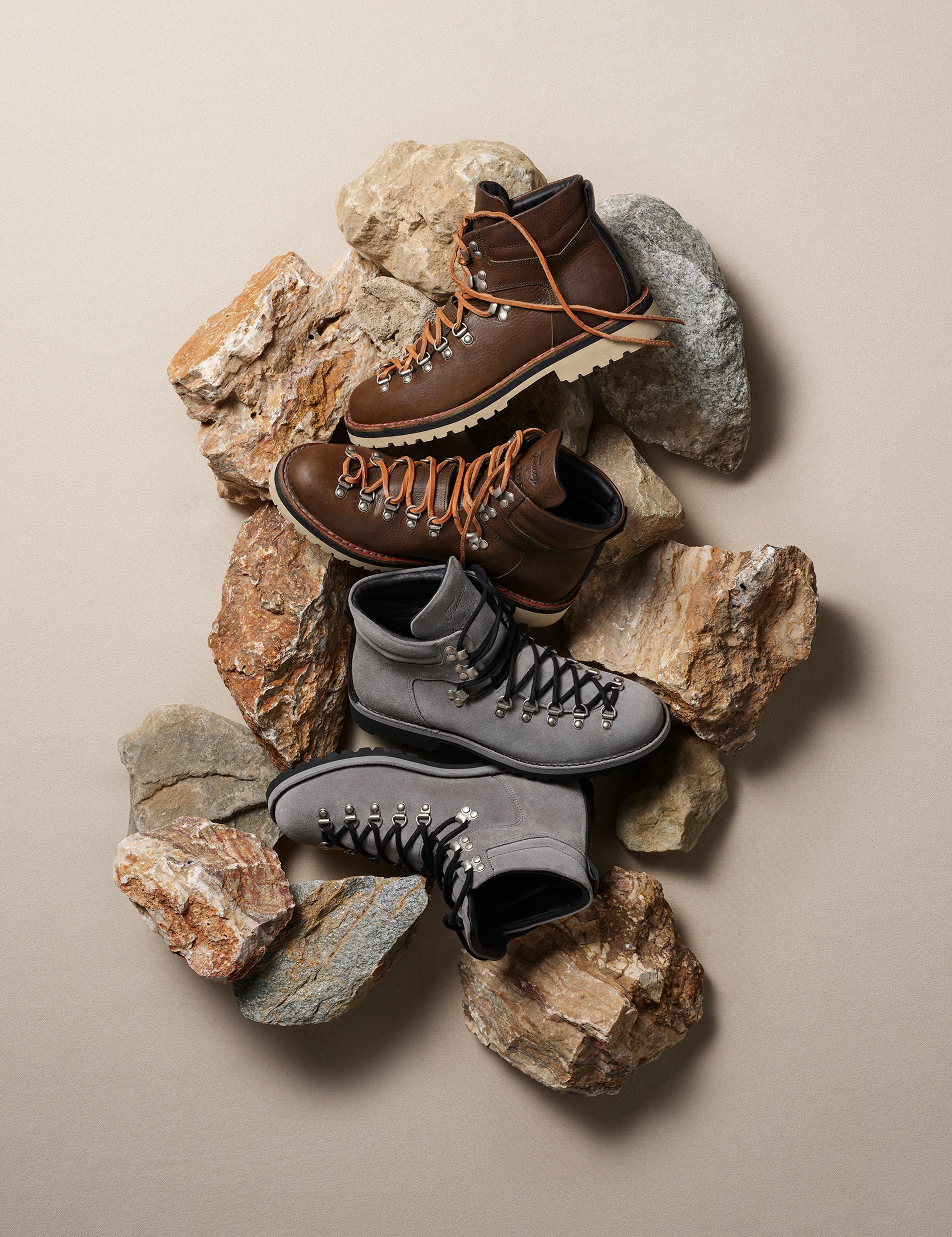 Studio photo of Dolomite Boots arranged on large rocks