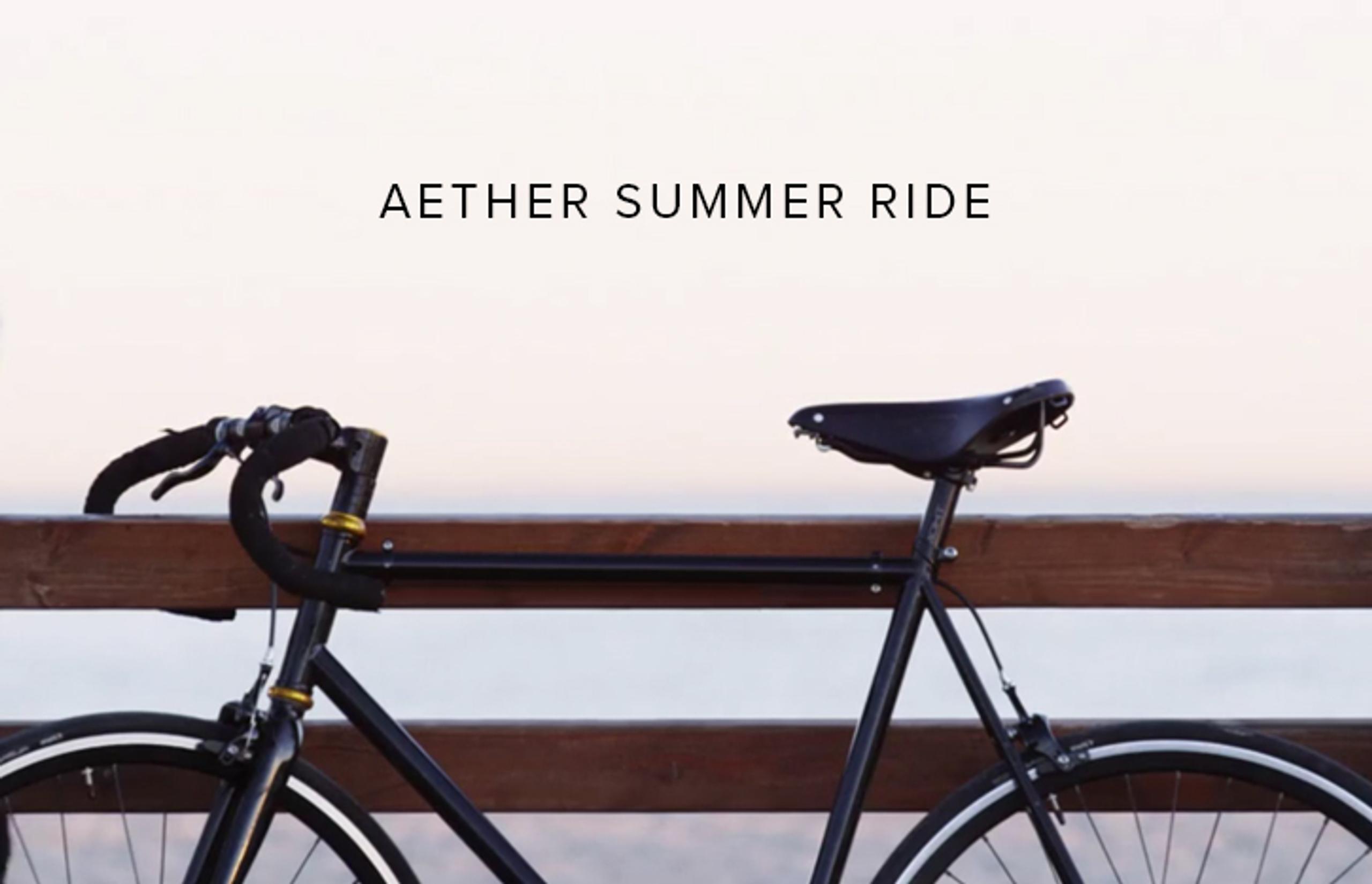 graphic with bike and text reading AETHER summer Ride