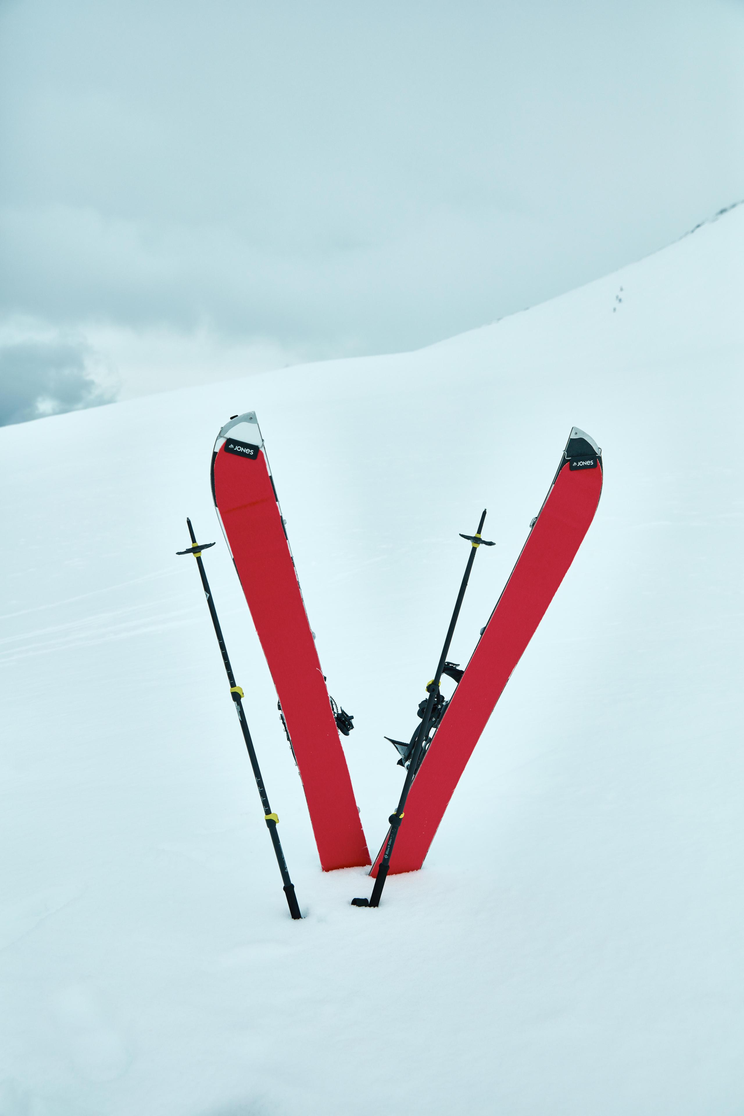 Red skis stuck in the snow in Iceland