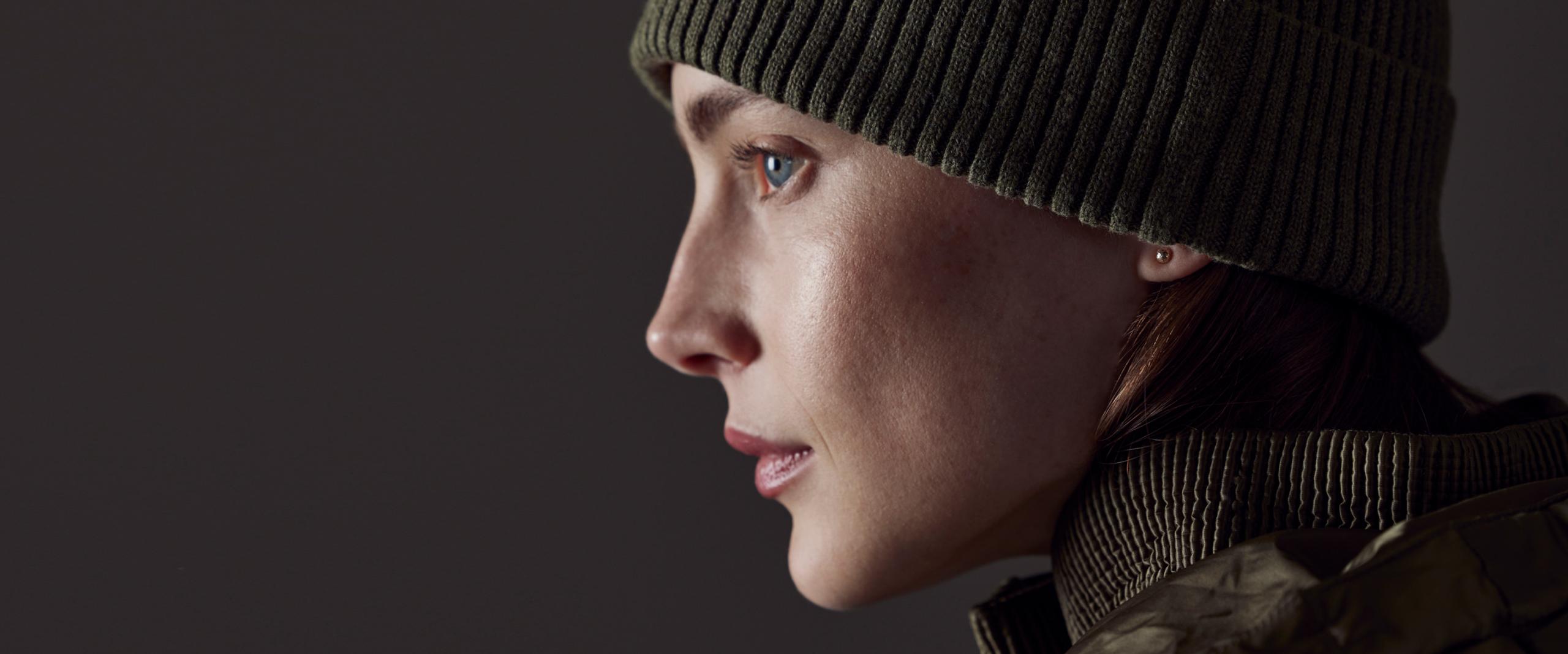 Profile of woman wearing Chalet Cotton Beanie