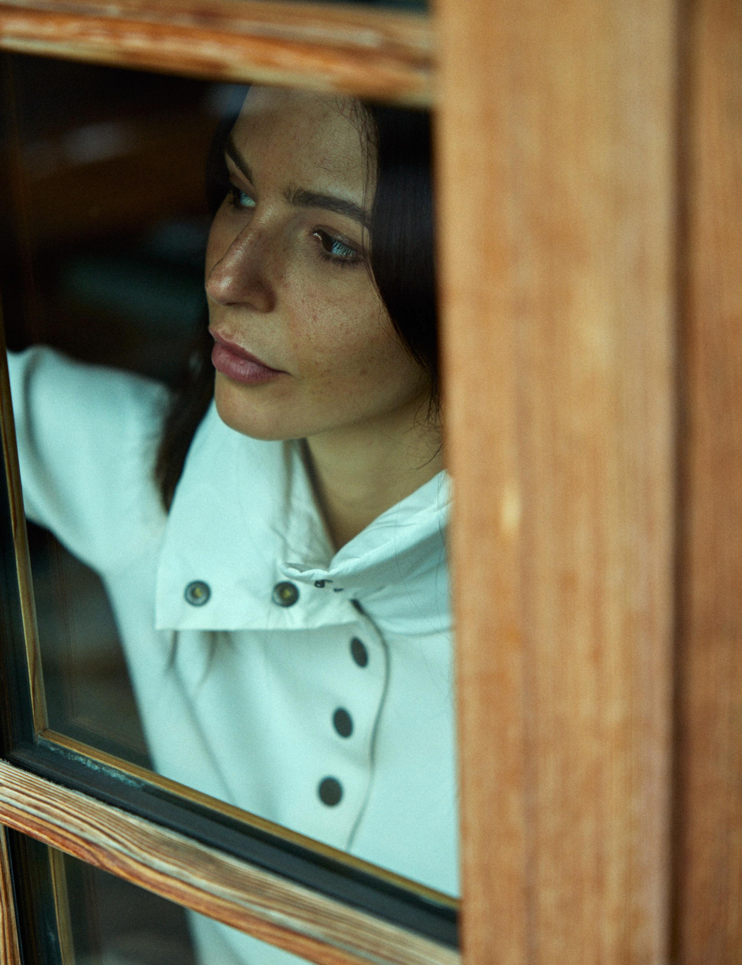 Women wearing Align Pullover by window