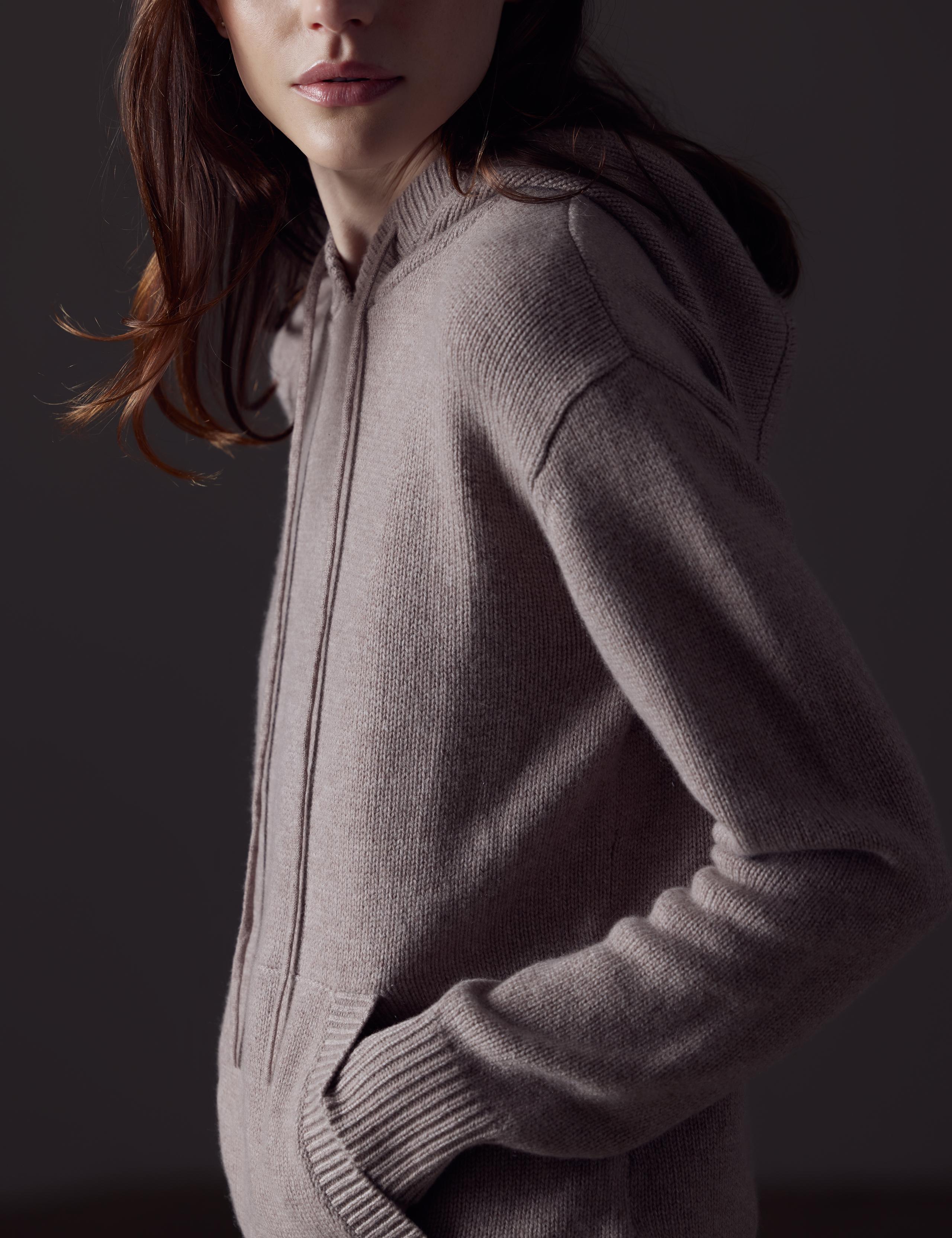 A woman in Ava Cashmere Hooded Sweater