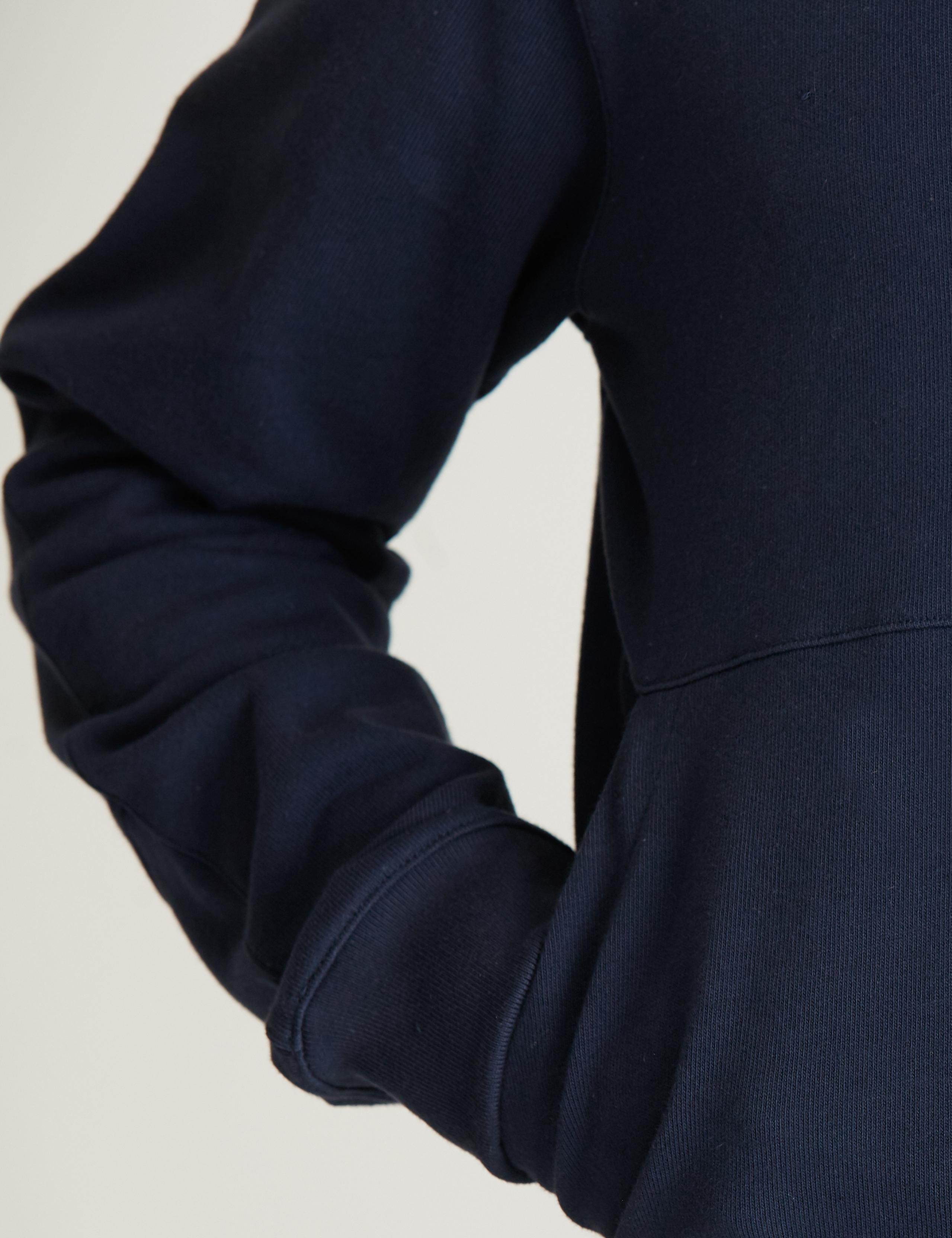 Closeup view of angled pockets on Jersey Hoodie