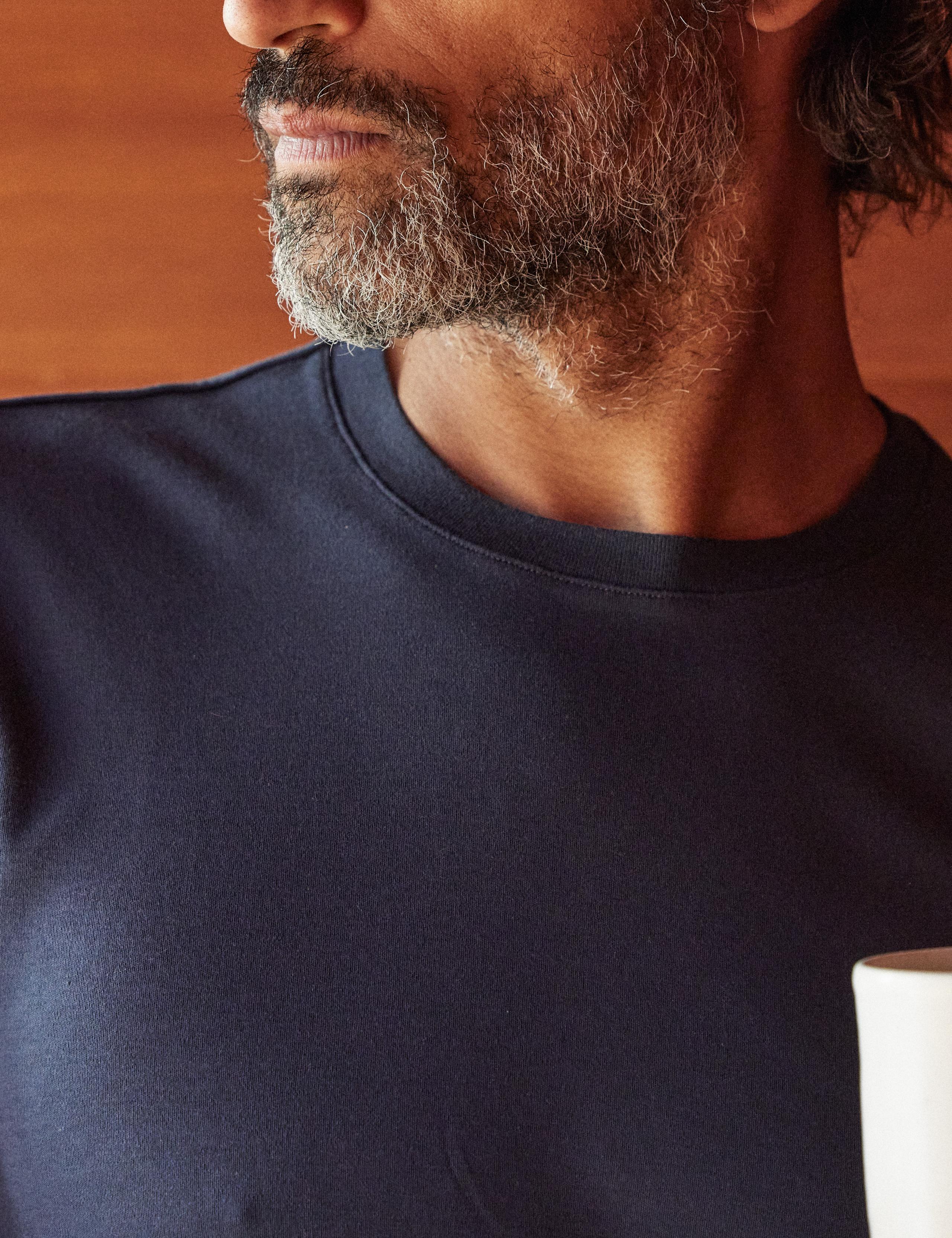 Neckline detail of man wearing Relaxed-Fit Crew Tee