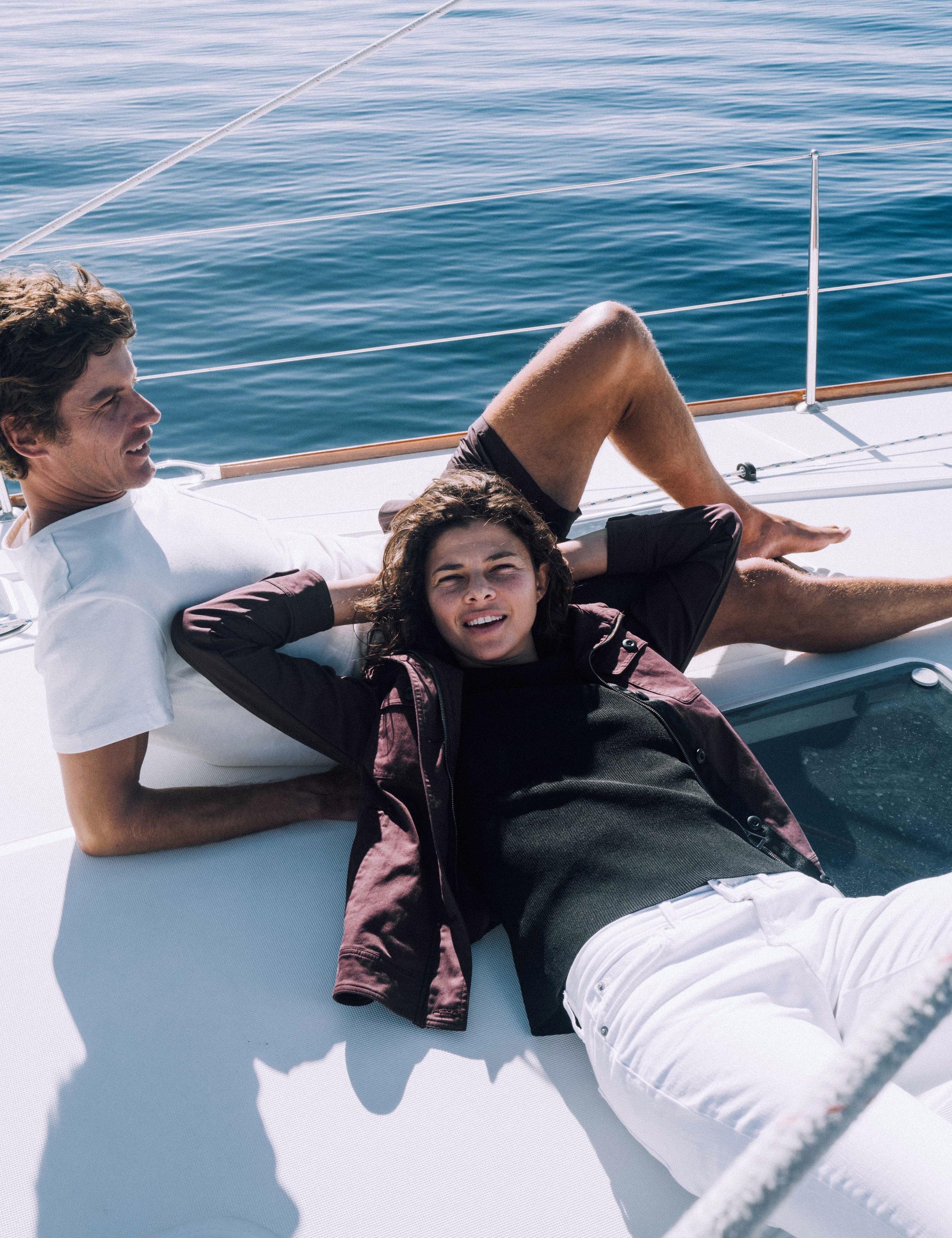 Couple laying on boat near Catalina Island