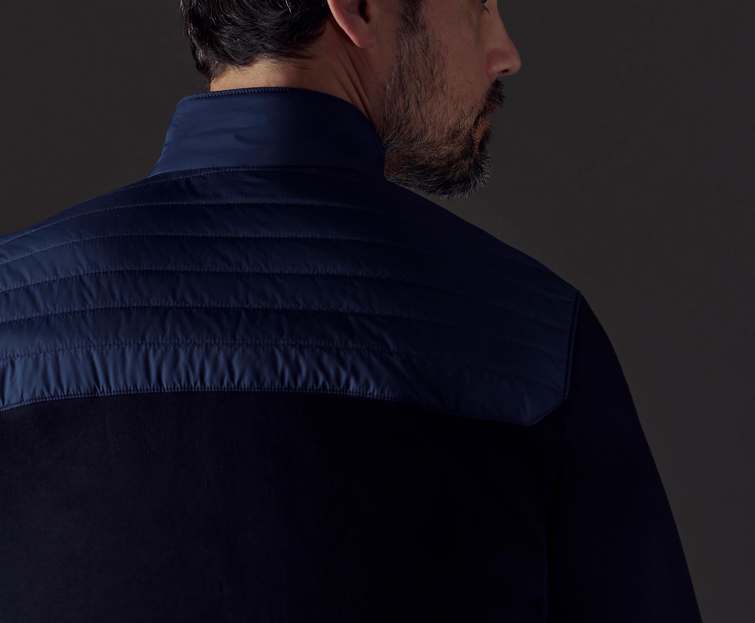 Closeup shoulder and neck detail of back of Watts Technical Jacket