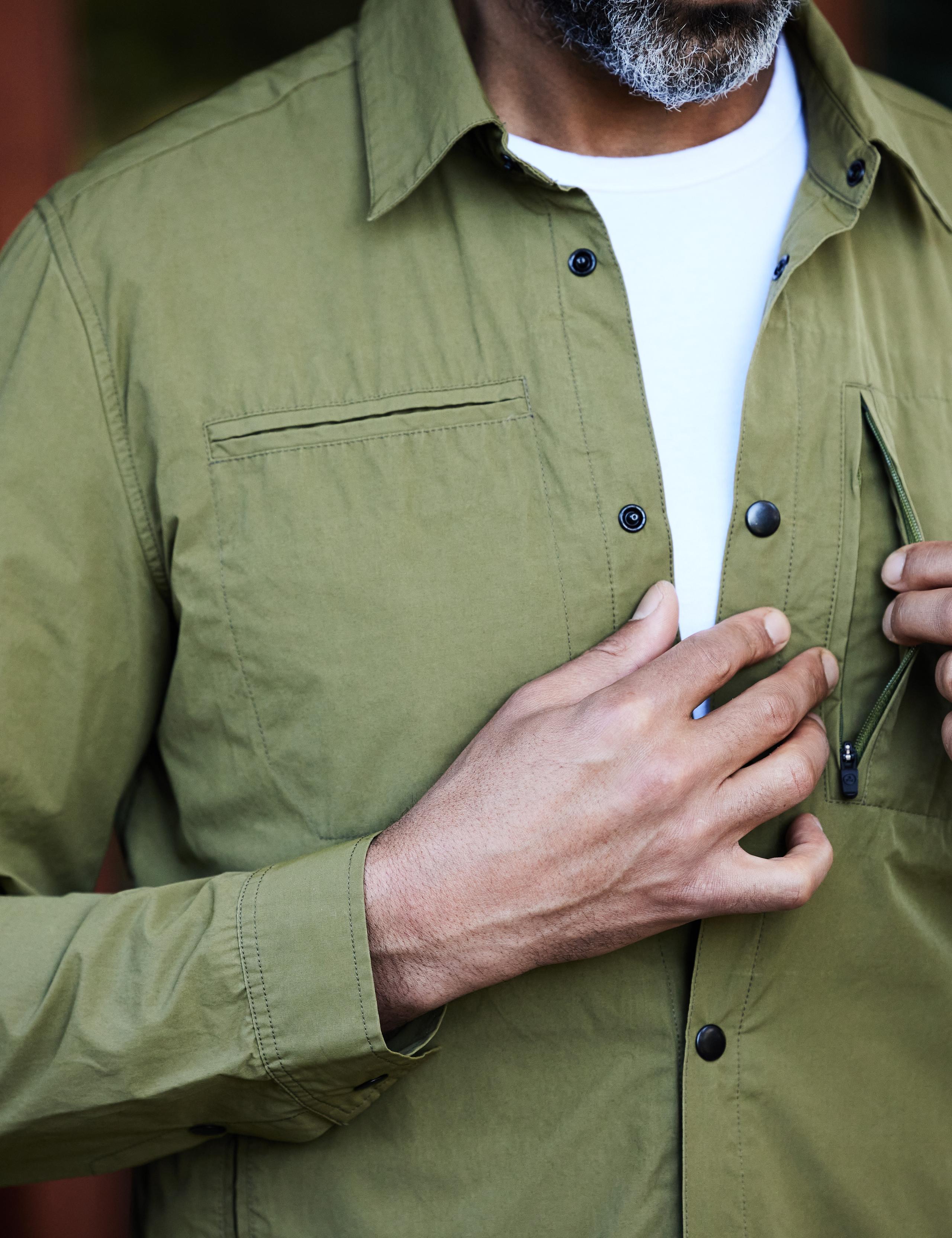 Detail of chest pocket of man wearing Echo Jacket