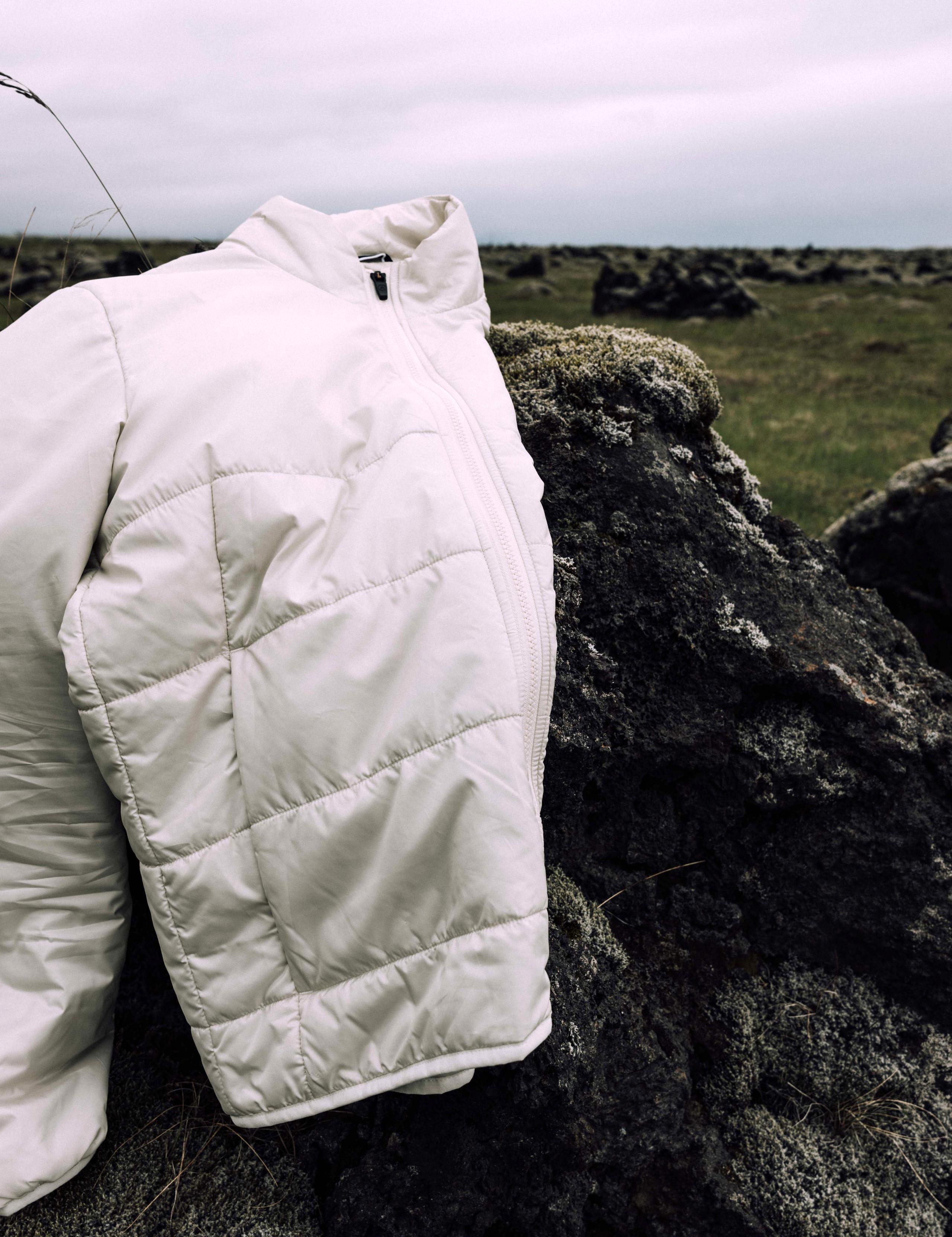 A still life shot of Eco Insulated Jacket in Iceland.