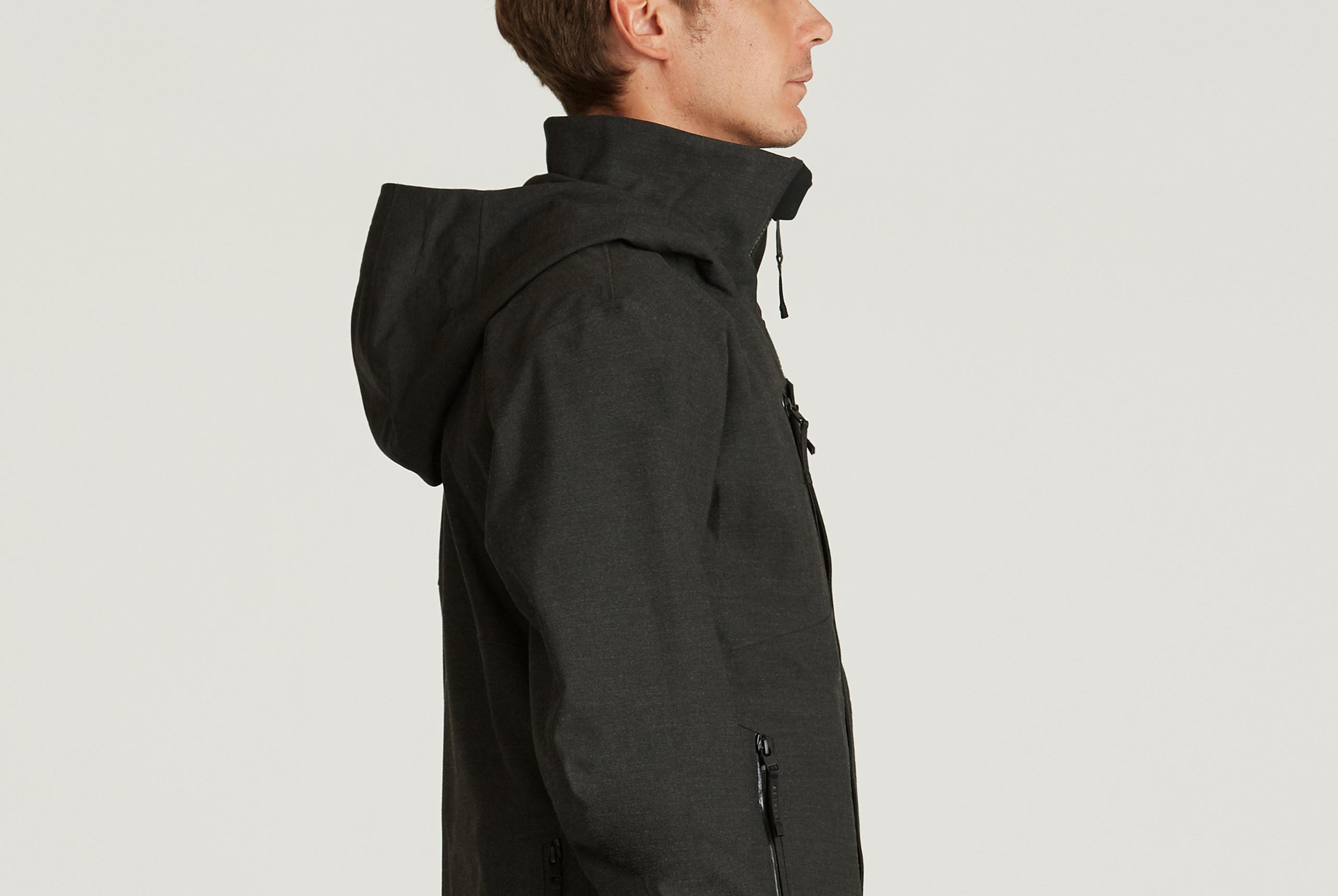 Profile view of man wearing Catalyst Snow Shell