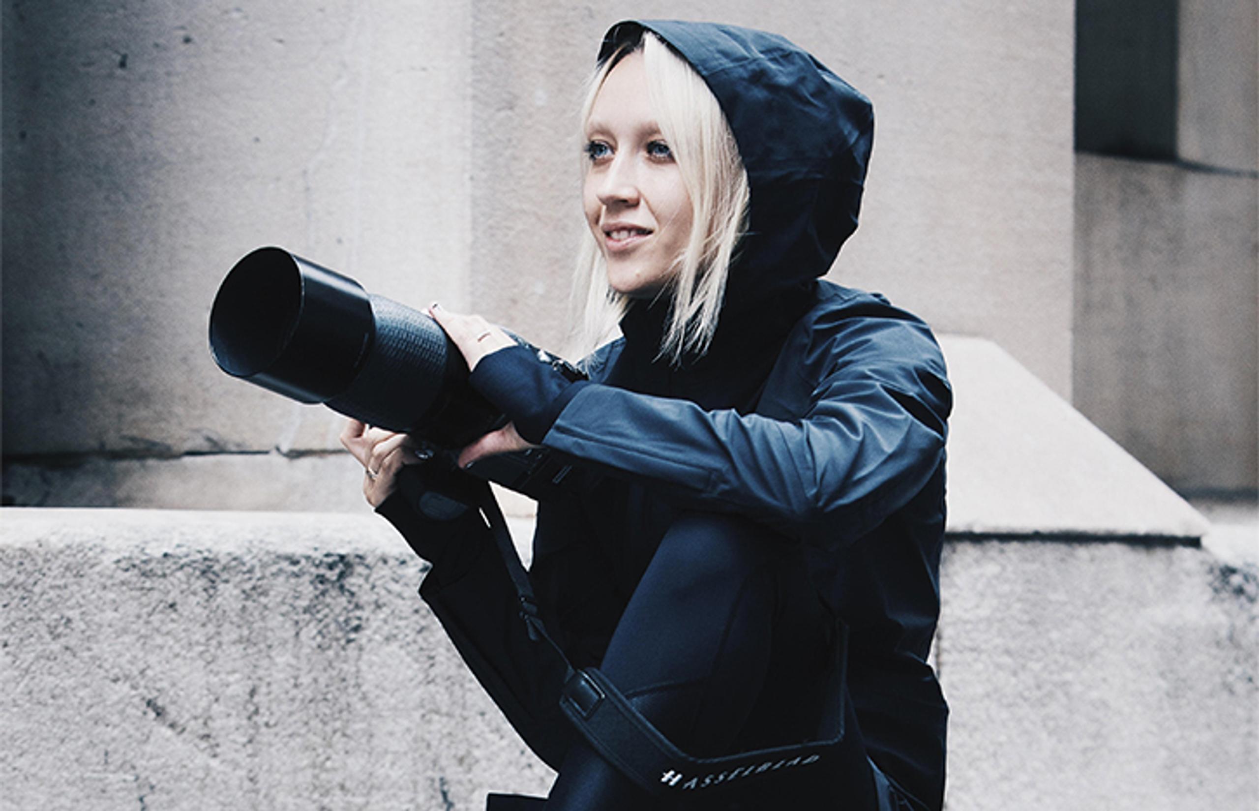 woman holding a Hasselblad Camera