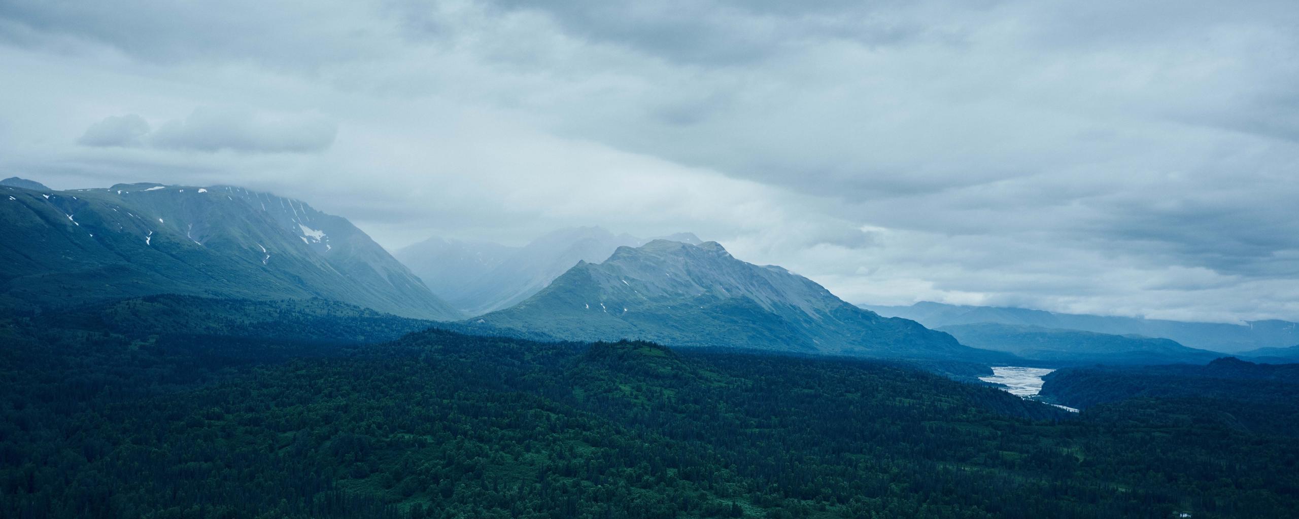 Landscape of Alaska countryside with snow-capped mountains