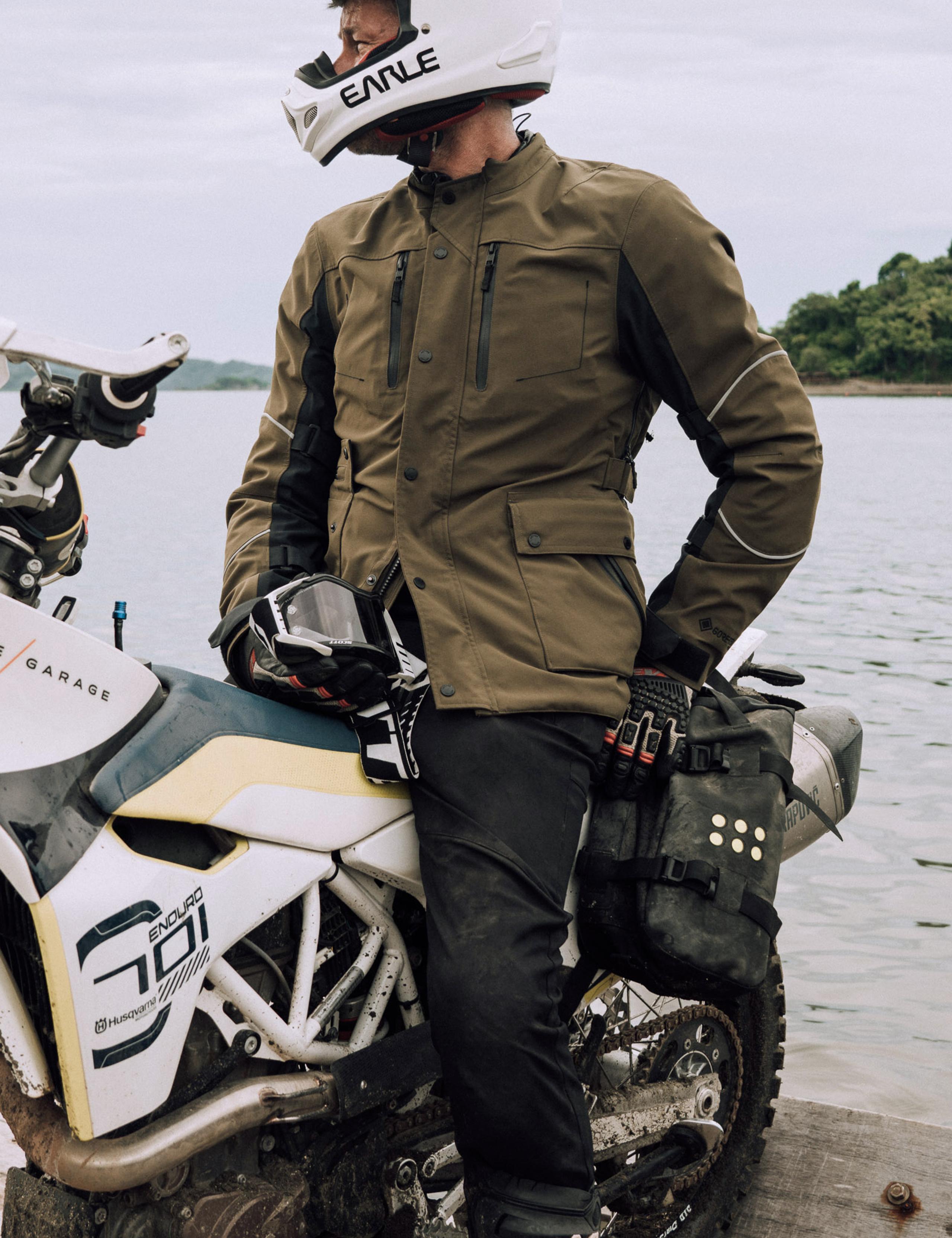 Man wan wearing Ramble Pant on motorcycle in Costa Rica